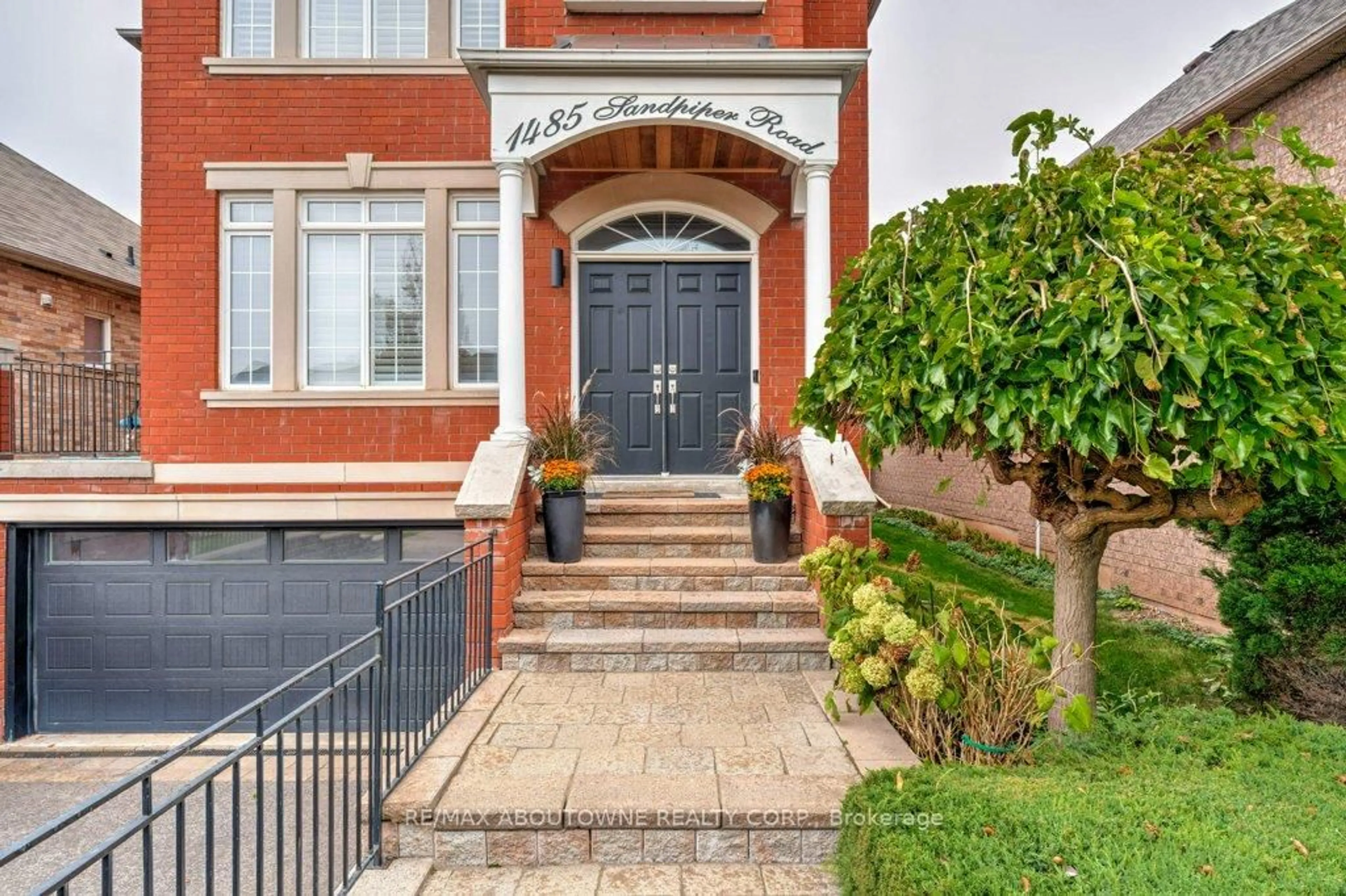 Home with brick exterior material, street for 1485 Sandpiper Rd, Oakville Ontario L6M 3R8