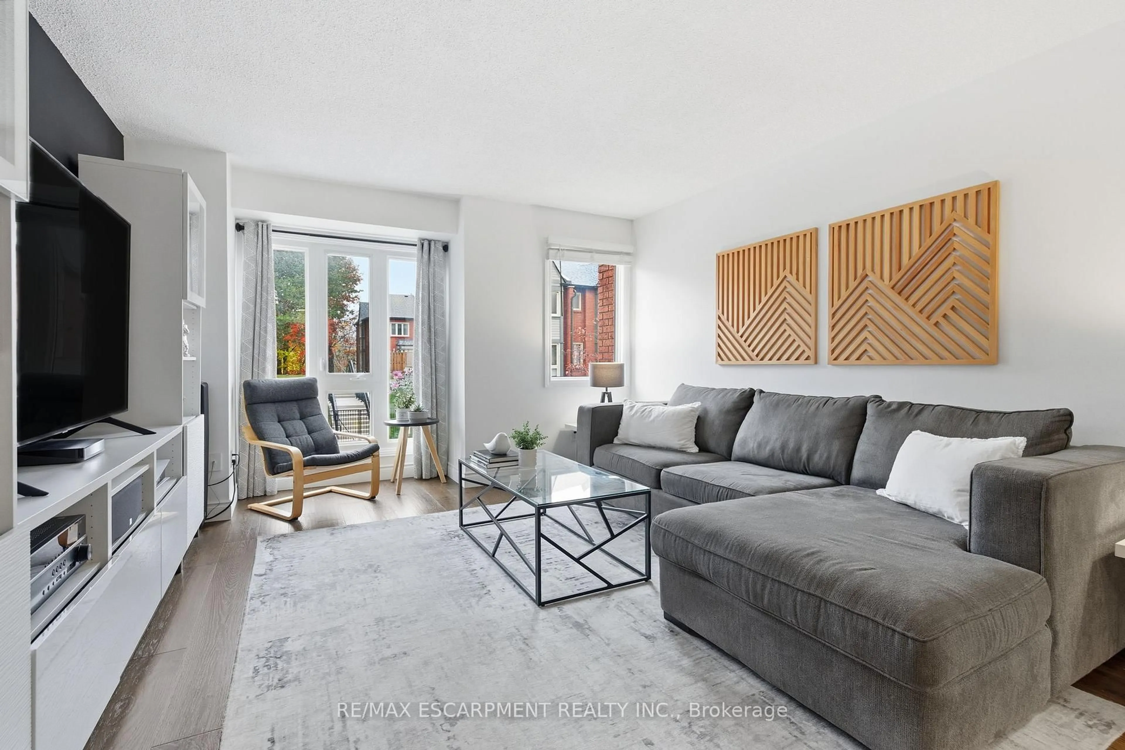 Living room with furniture, unknown for 895 Maple Ave #201, Burlington Ontario L7S 2H7