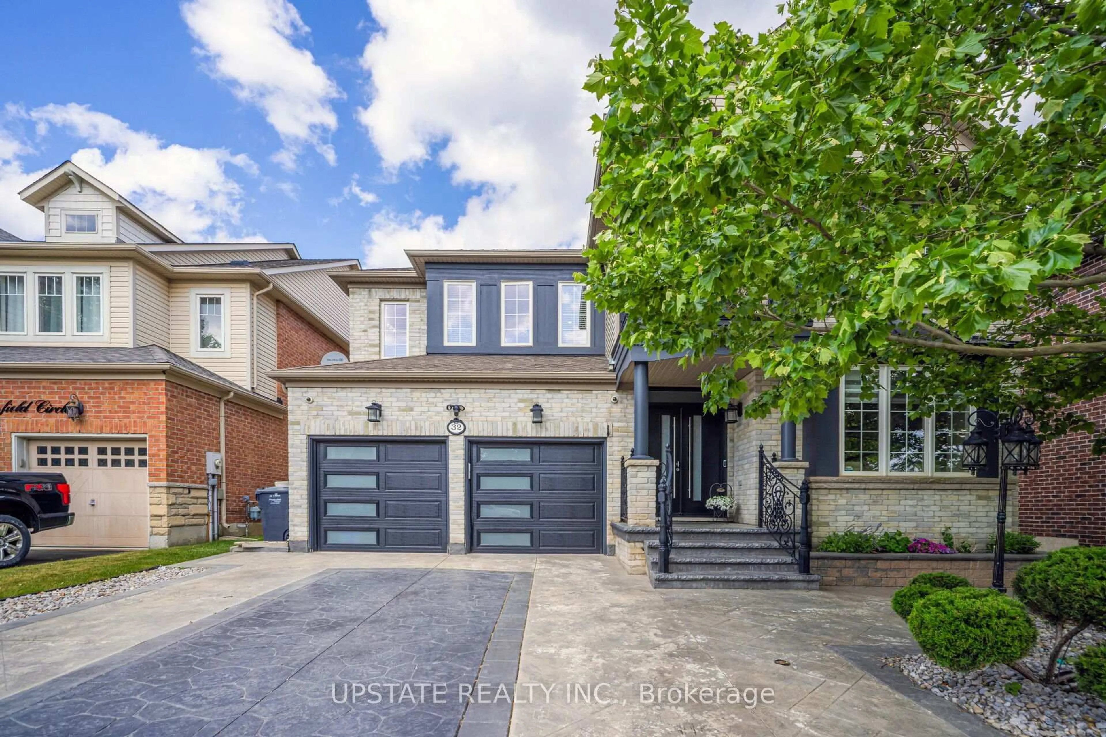 Home with brick exterior material, street for 32 Cottonfield Circ, Caledon Ontario L7C 3M9