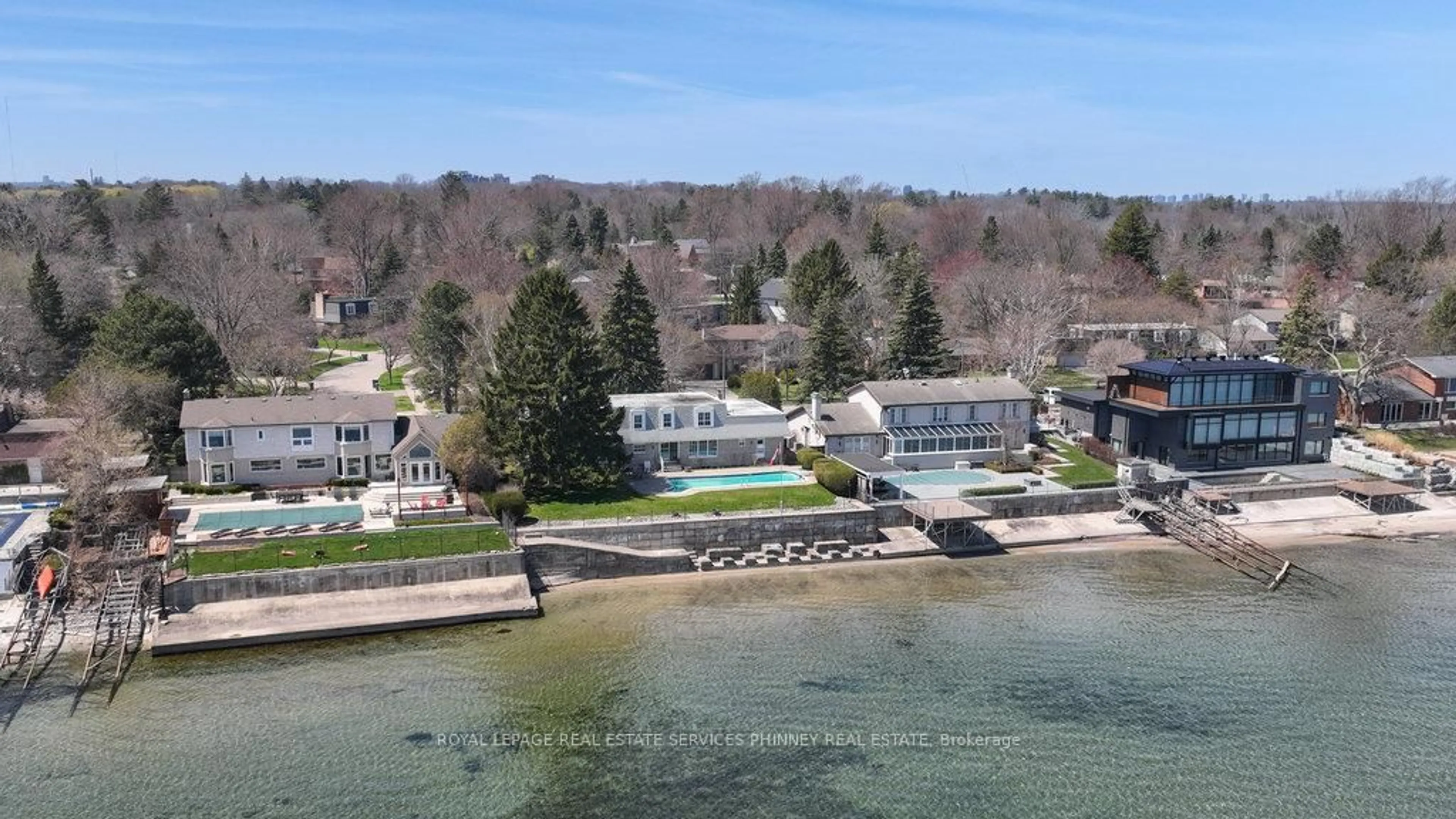 A pic from outside/outdoor area/front of a property/back of a property/a pic from drone, water/lake/river/ocean view for 1460 Watersedge Rd, Mississauga Ontario L5J 1A4