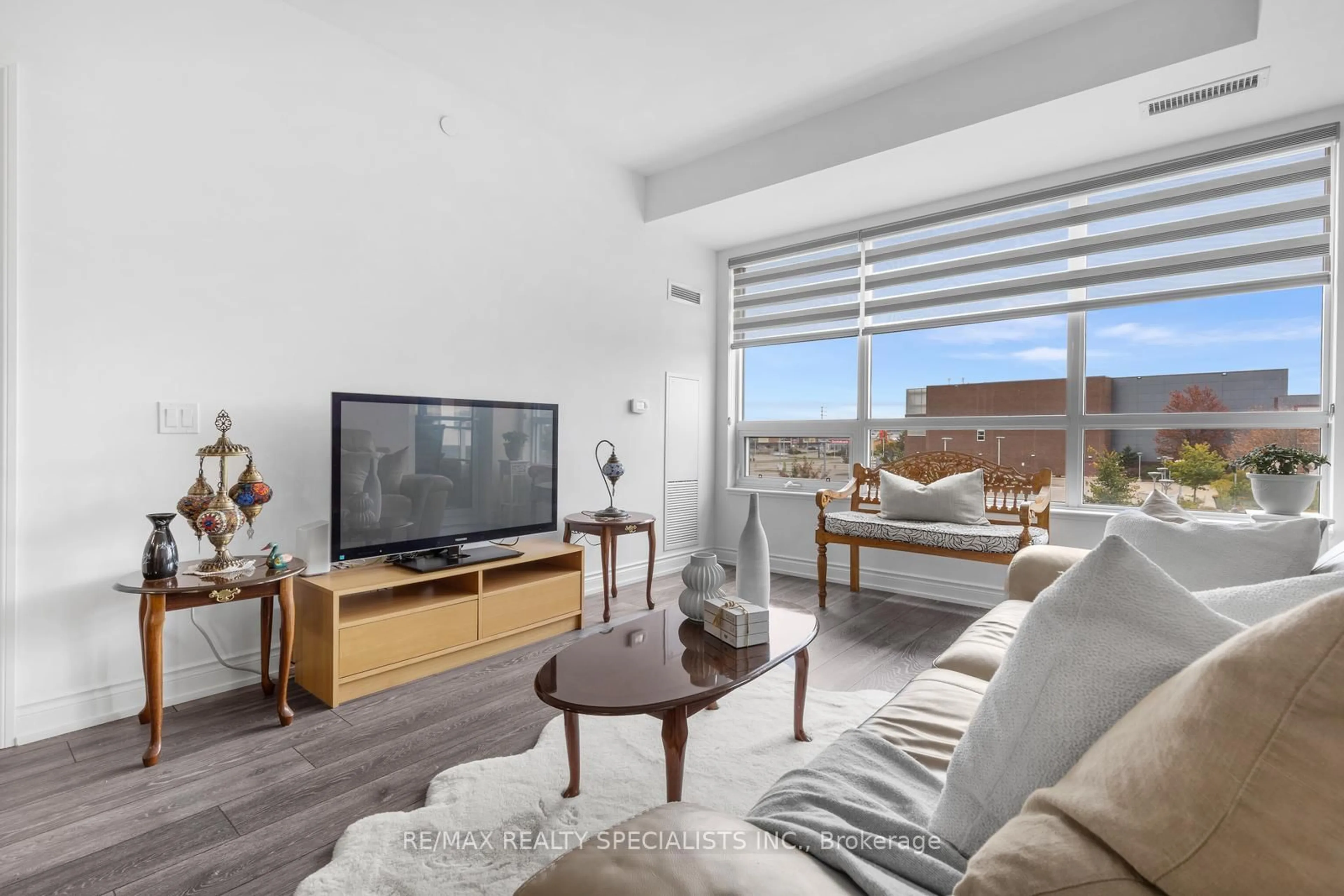 Living room with furniture, unknown for 1050 Main St #226, Milton Ontario L9T 9M3