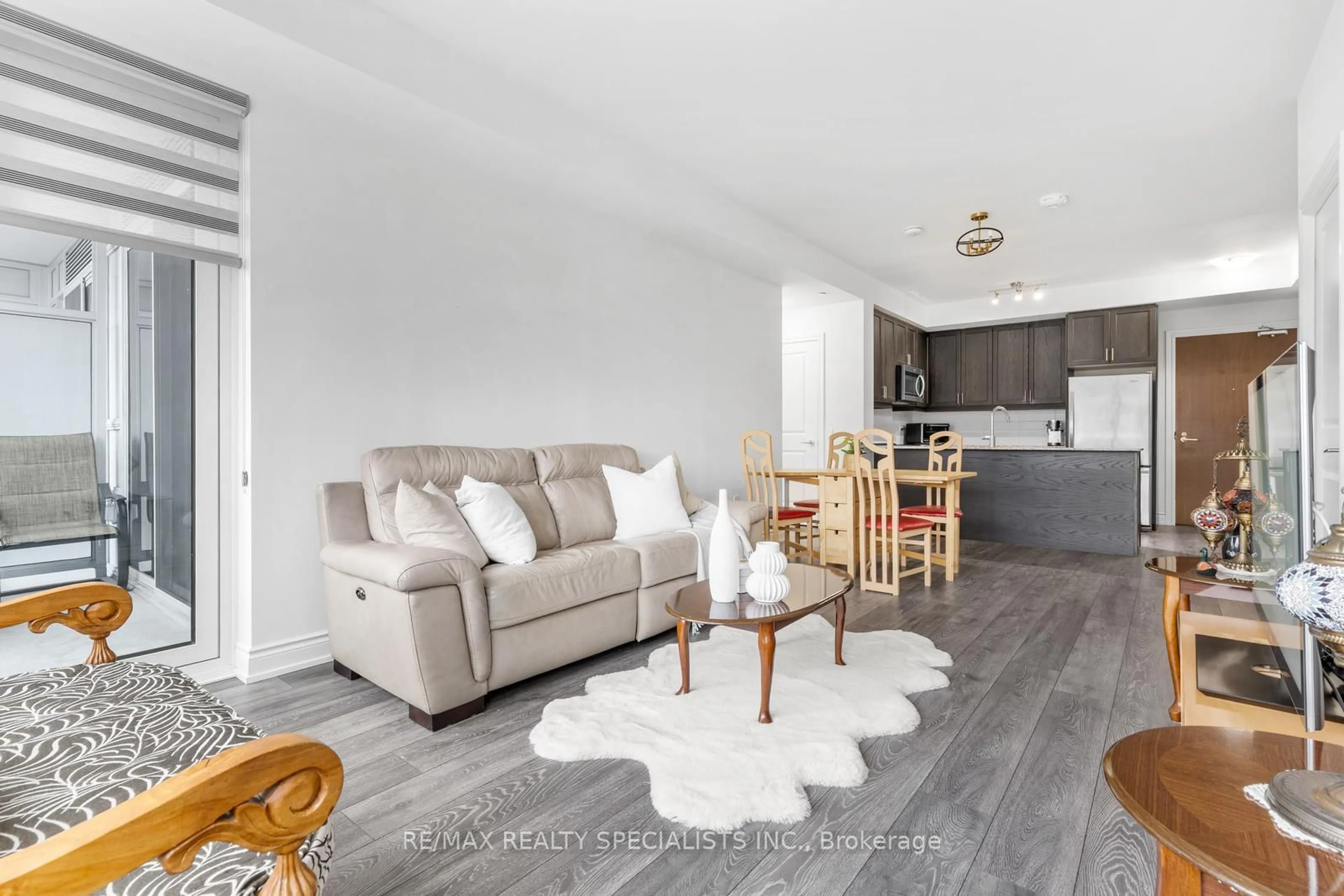 Living room with furniture, unknown for 1050 Main St #226, Milton Ontario L9T 9M3