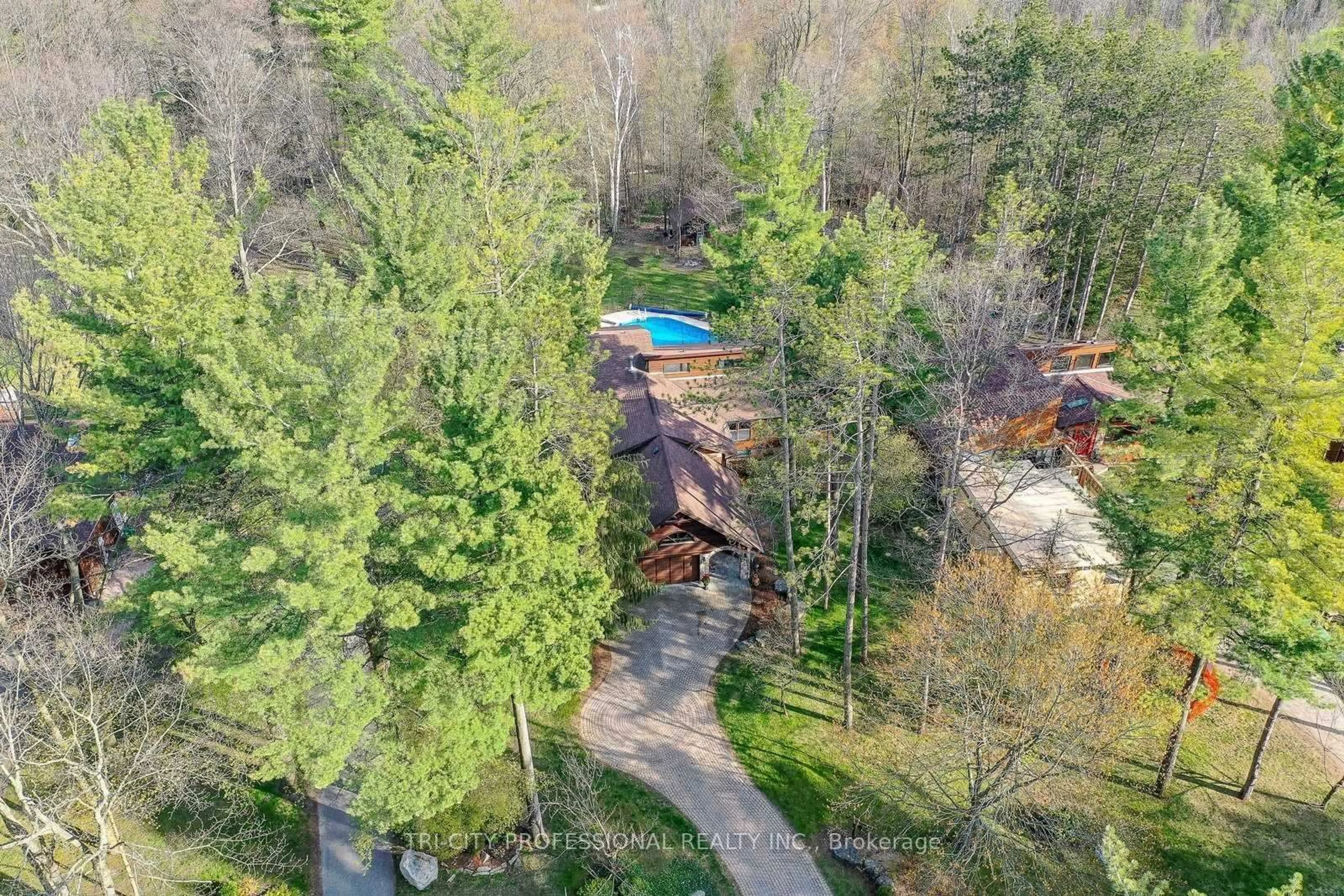 A pic from outside/outdoor area/front of a property/back of a property/a pic from drone, forest/trees view for 43 Olivers Lane, Caledon Ontario L7C 1G5