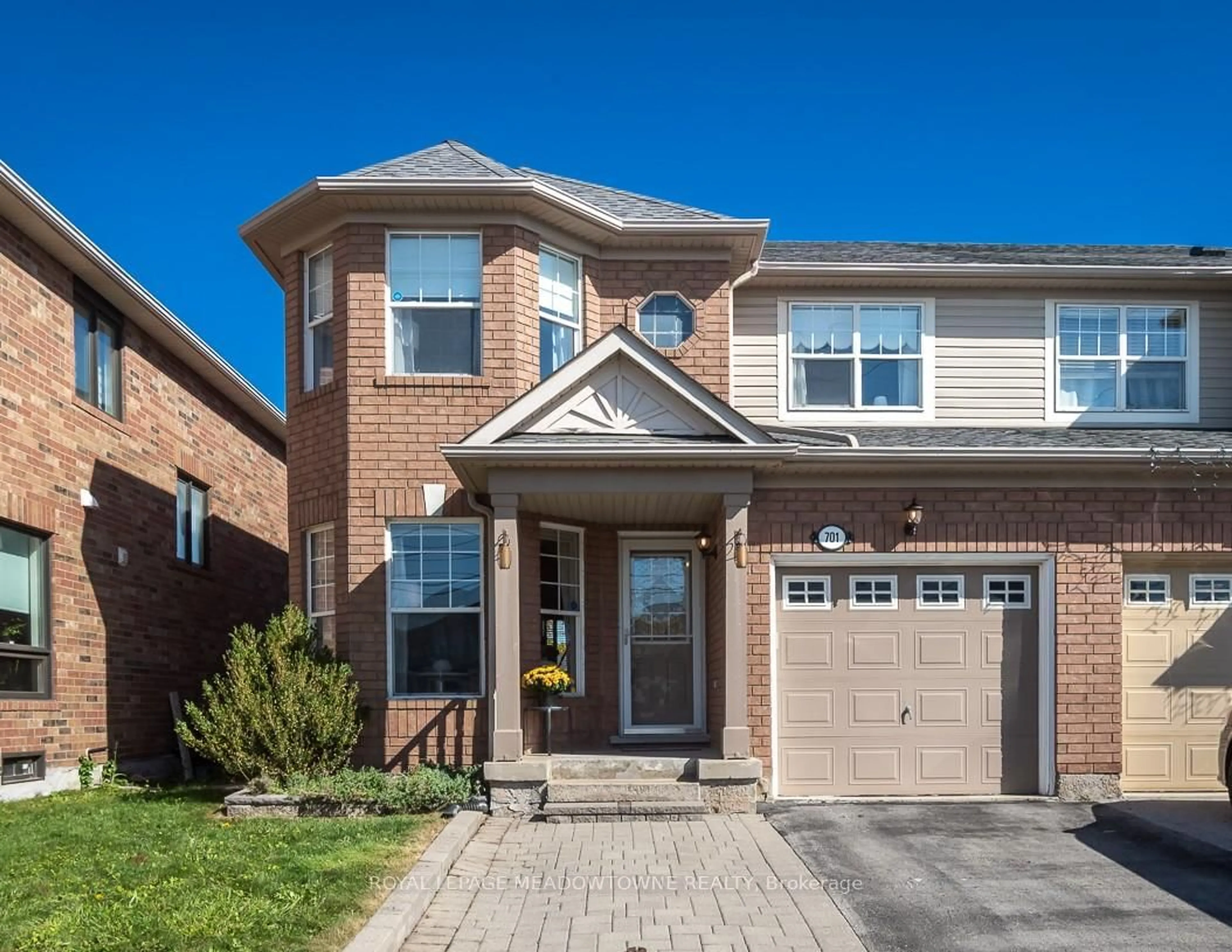 Home with brick exterior material, street for 701 Thompson Rd, Milton Ontario L9T 5W8