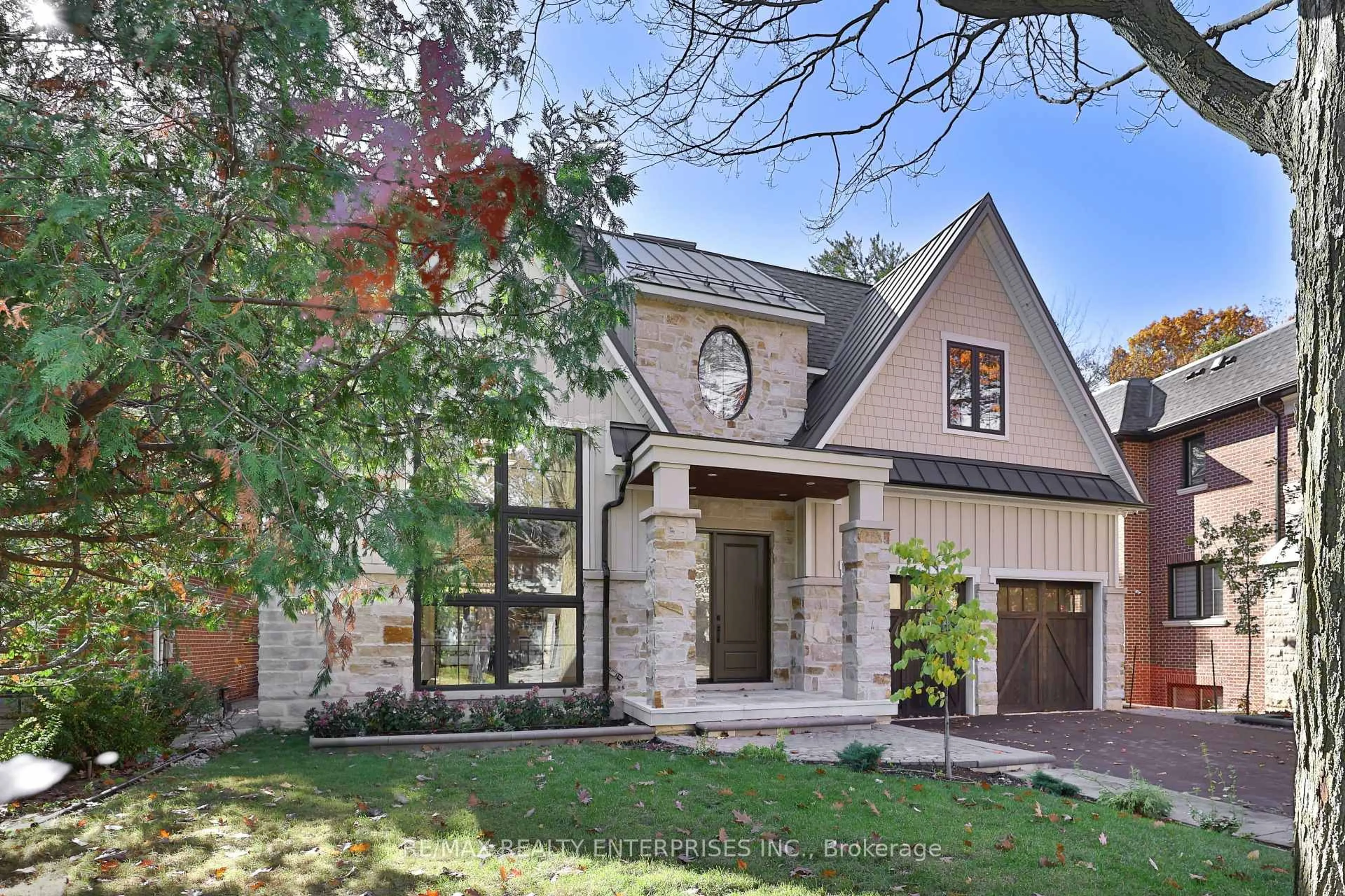 Home with brick exterior material, street for 1492 Trotwood Ave, Mississauga Ontario L5G 3Z9