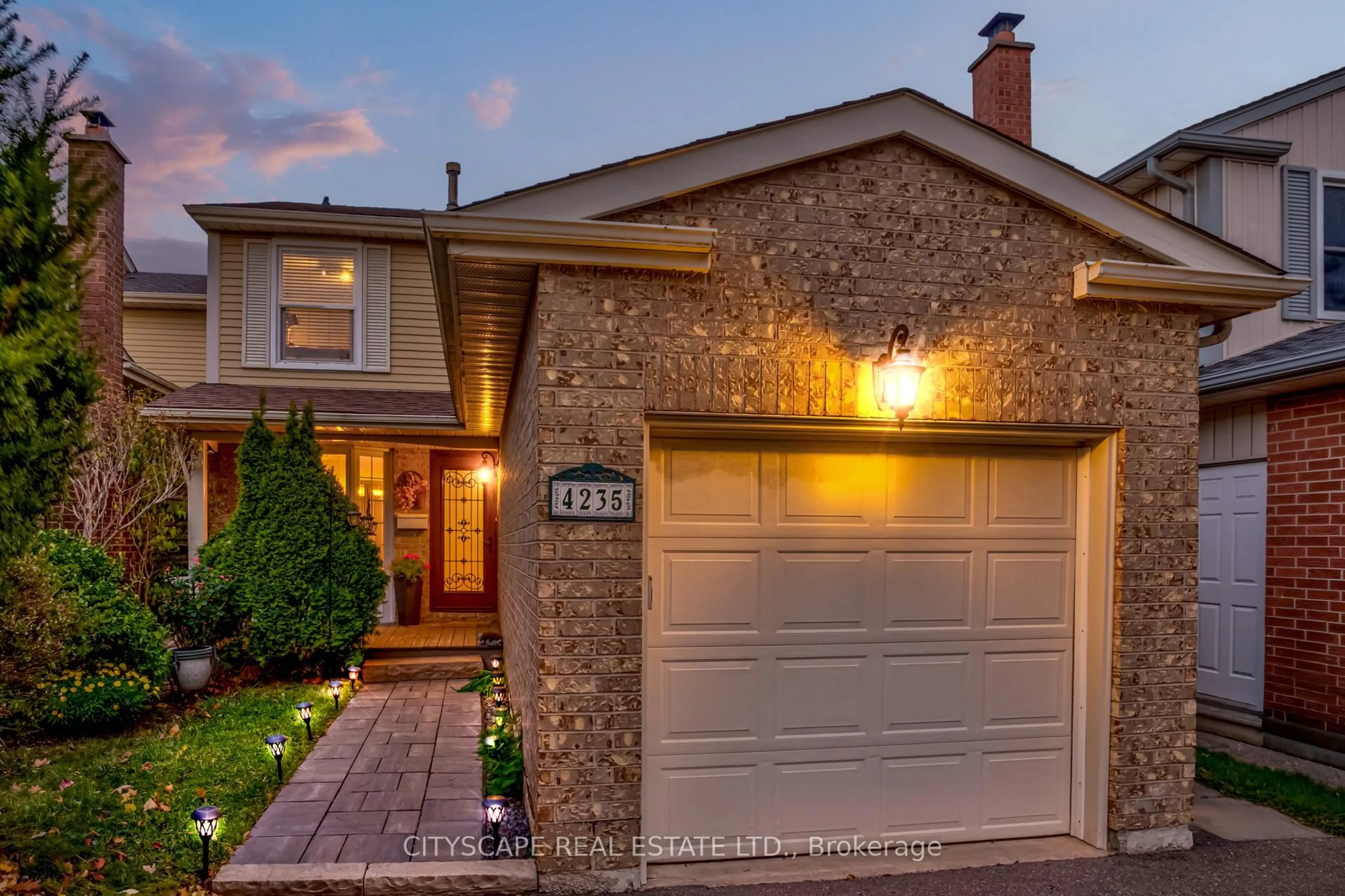 Home with brick exterior material, street for 4235 Stonemason Cres, Mississauga Ontario L5L 2Z6