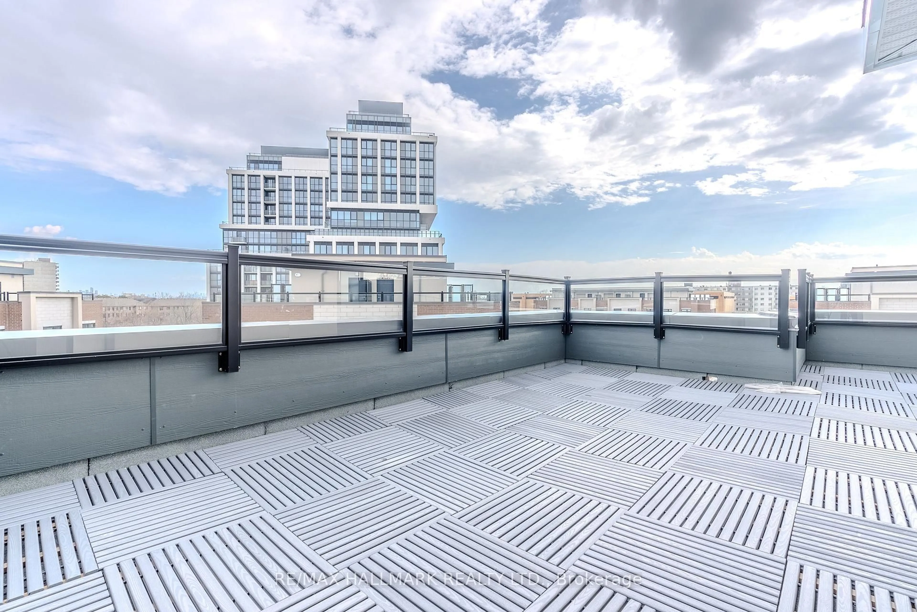 Patio, city buildings view from balcony for 1085 Douglas Mccurdy Common #216, Mississauga Ontario L5G 4B1