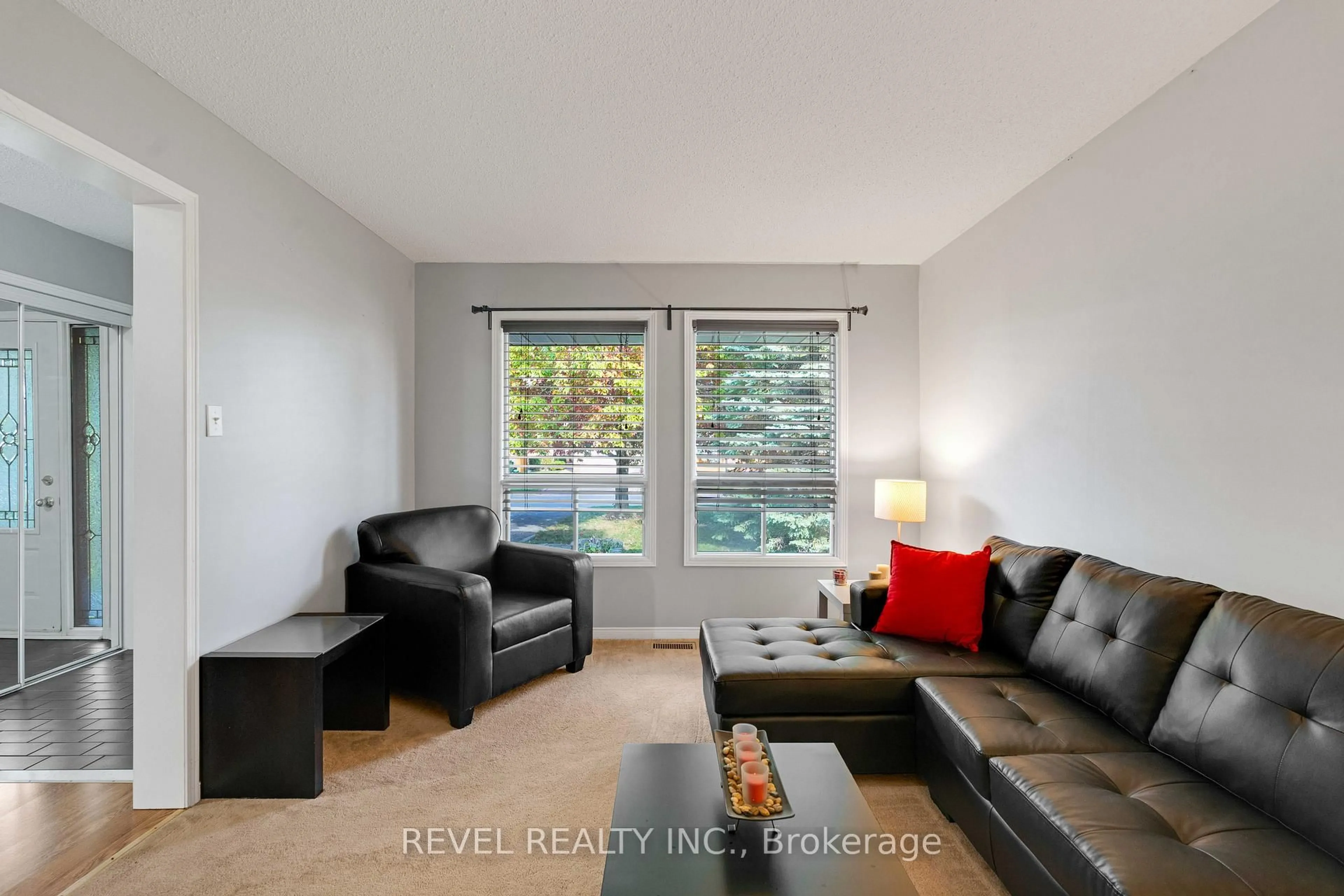 Living room with furniture, wood/laminate floor for 42 Deer Valley Dr, Caledon Ontario L7E 2E5