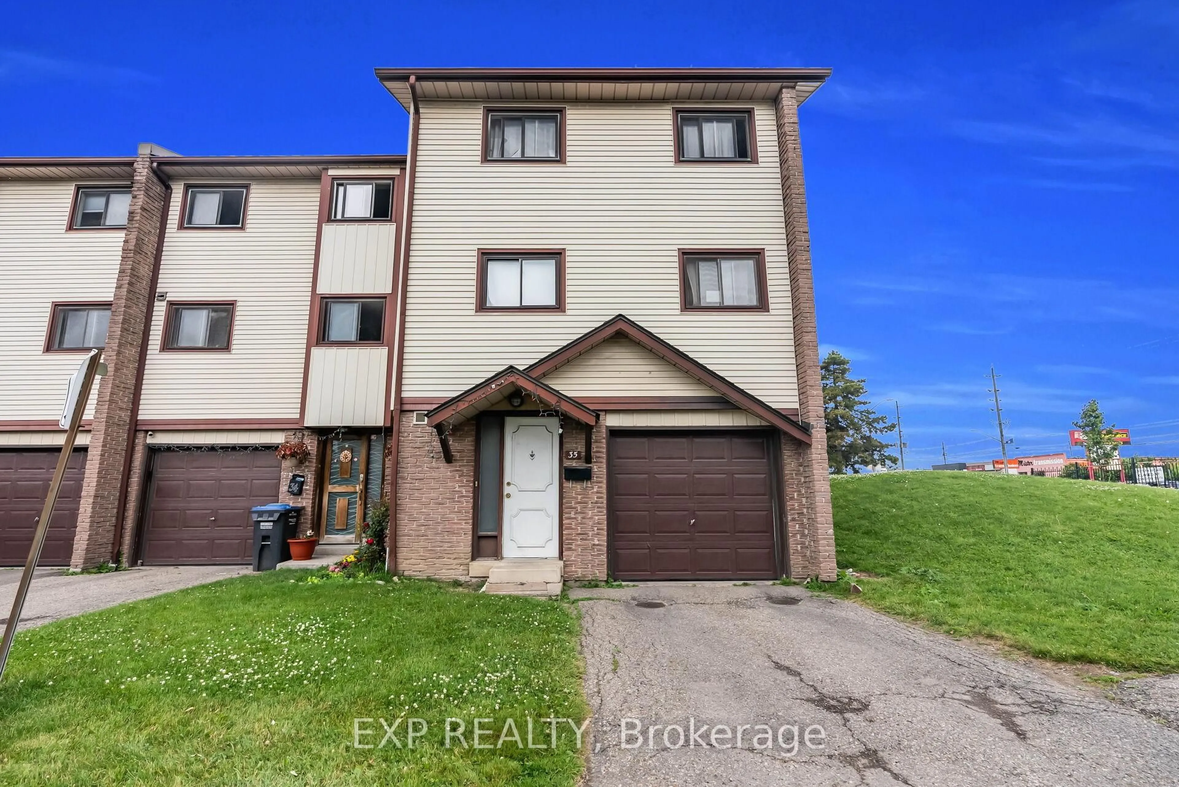 A pic from outside/outdoor area/front of a property/back of a property/a pic from drone, unknown for 35 McCallum Crt, Brampton Ontario L6W 3M3