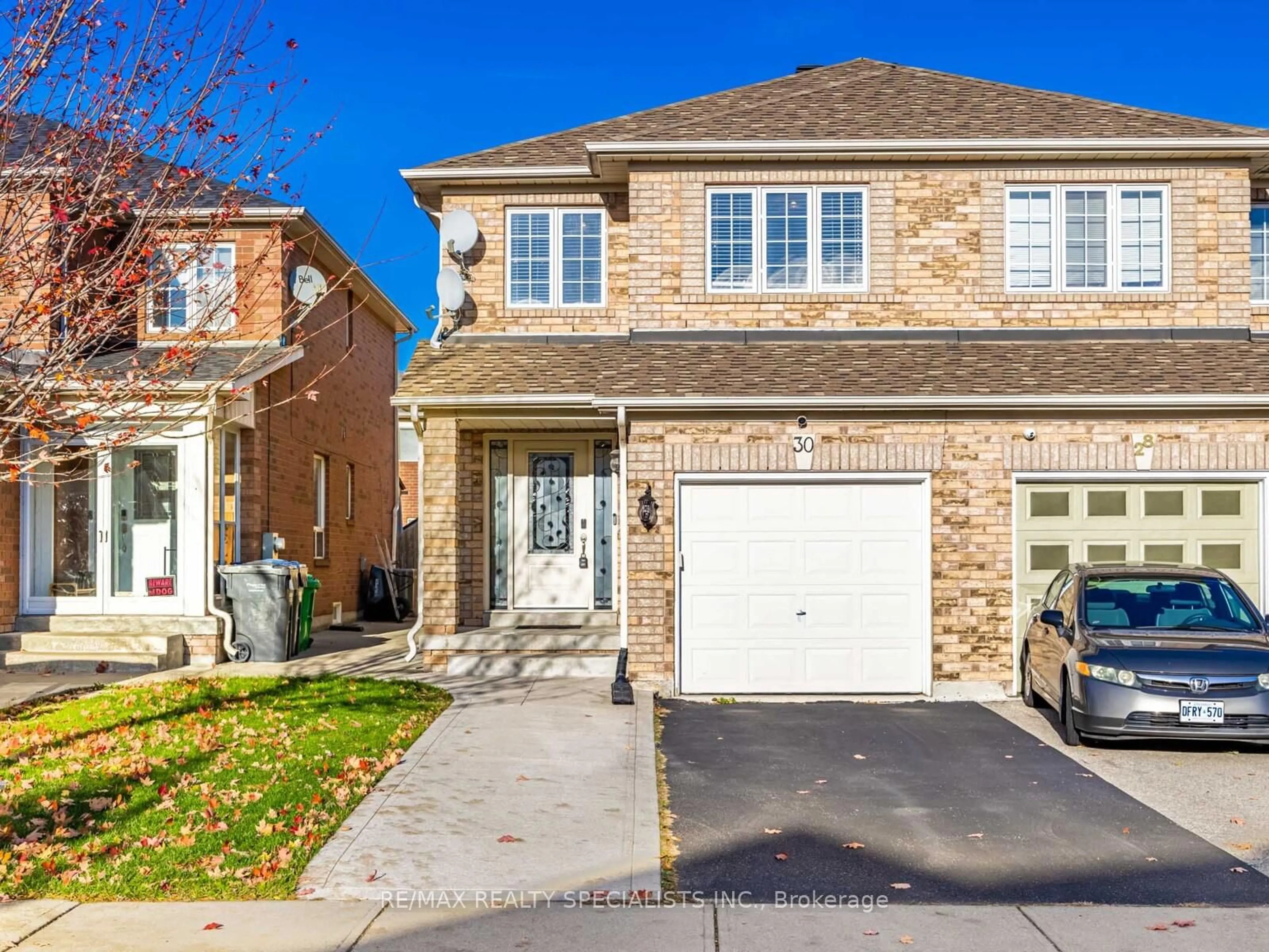 Home with brick exterior material, street for 30 Baha Cres, Brampton Ontario L7A 2J3