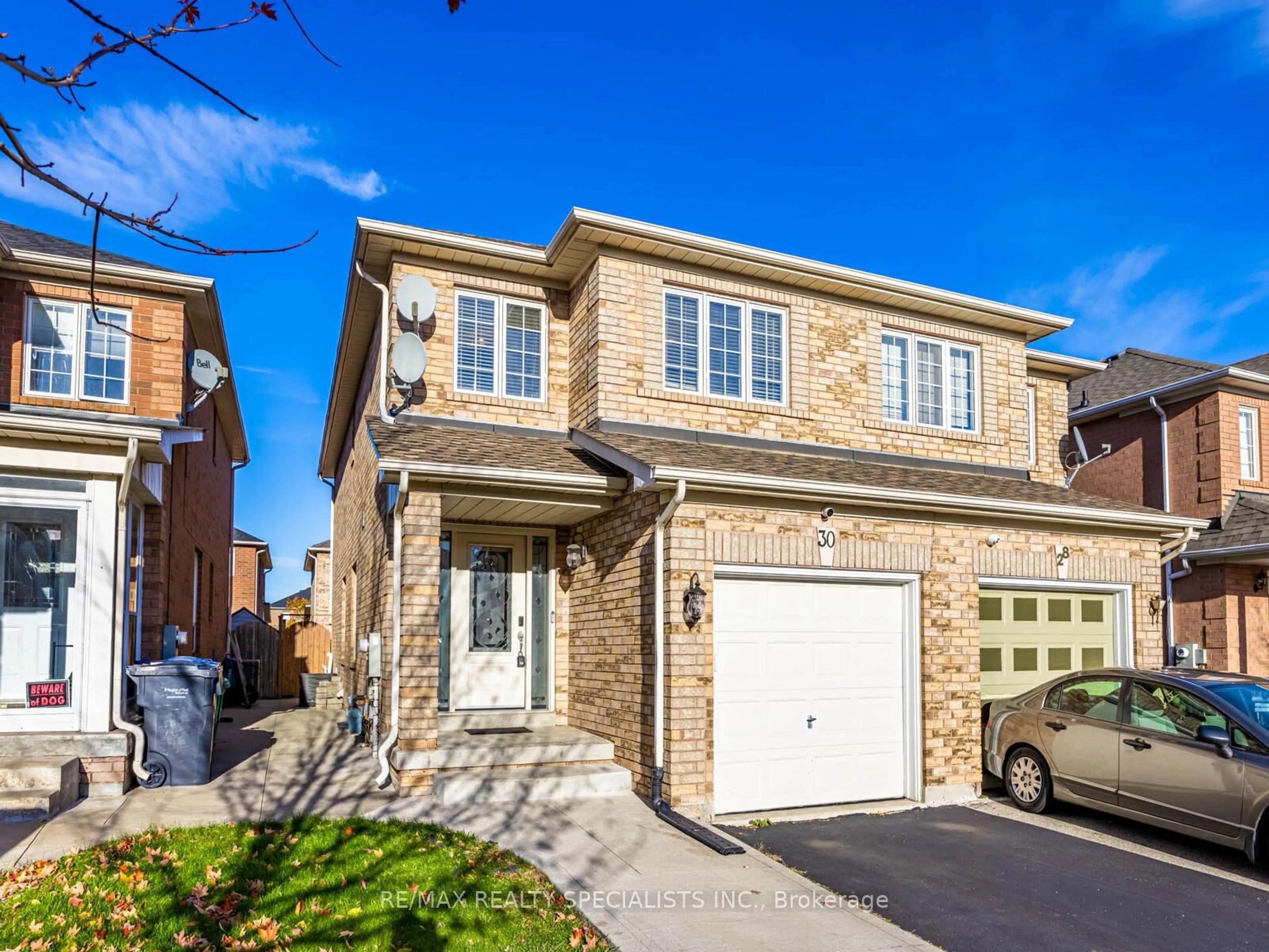 Home with brick exterior material, street for 30 Baha Cres, Brampton Ontario L7A 2J3