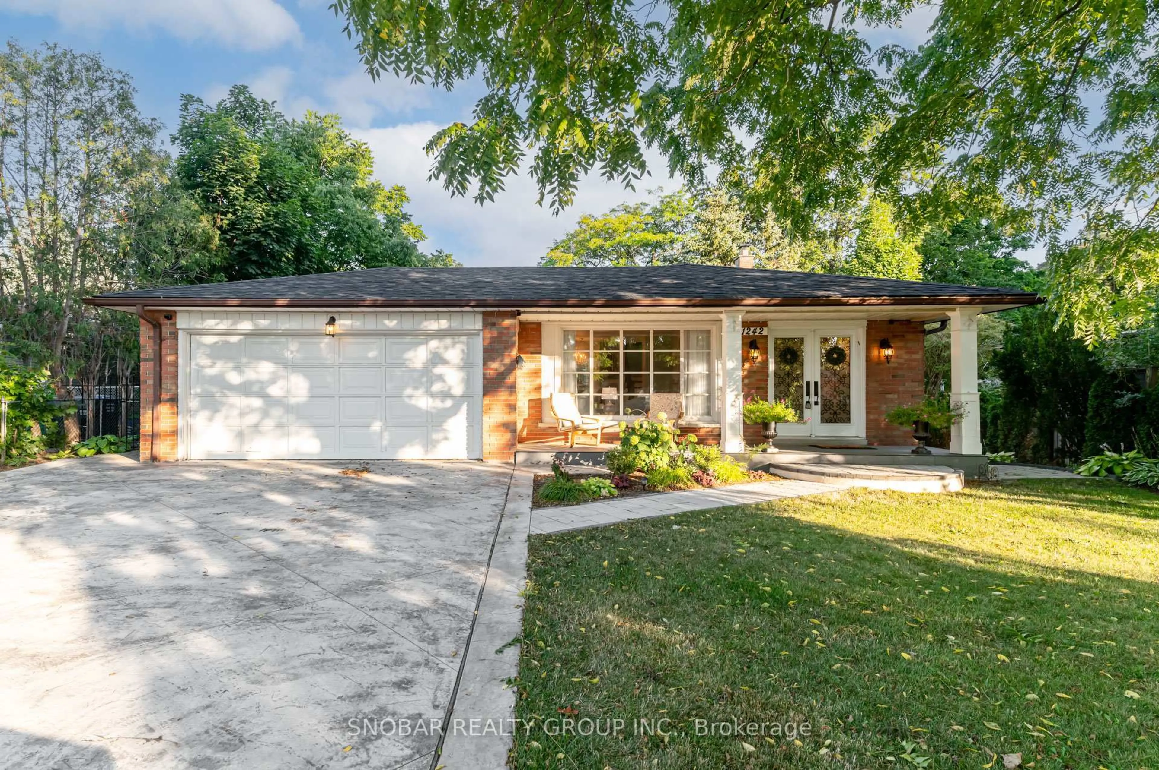 Home with brick exterior material, street for 1242 Forestwood Dr, Mississauga Ontario L5C 1J1