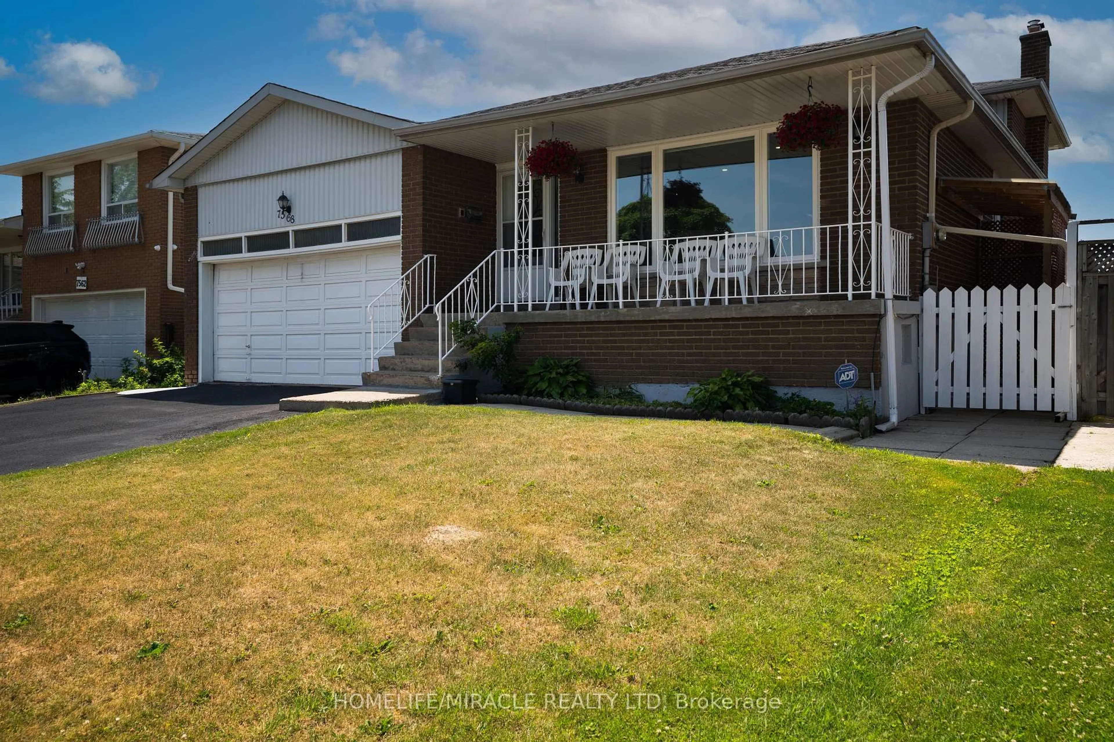 Home with vinyl exterior material, street for 7568 Middleshire Dr, Mississauga Ontario L4T 3S2