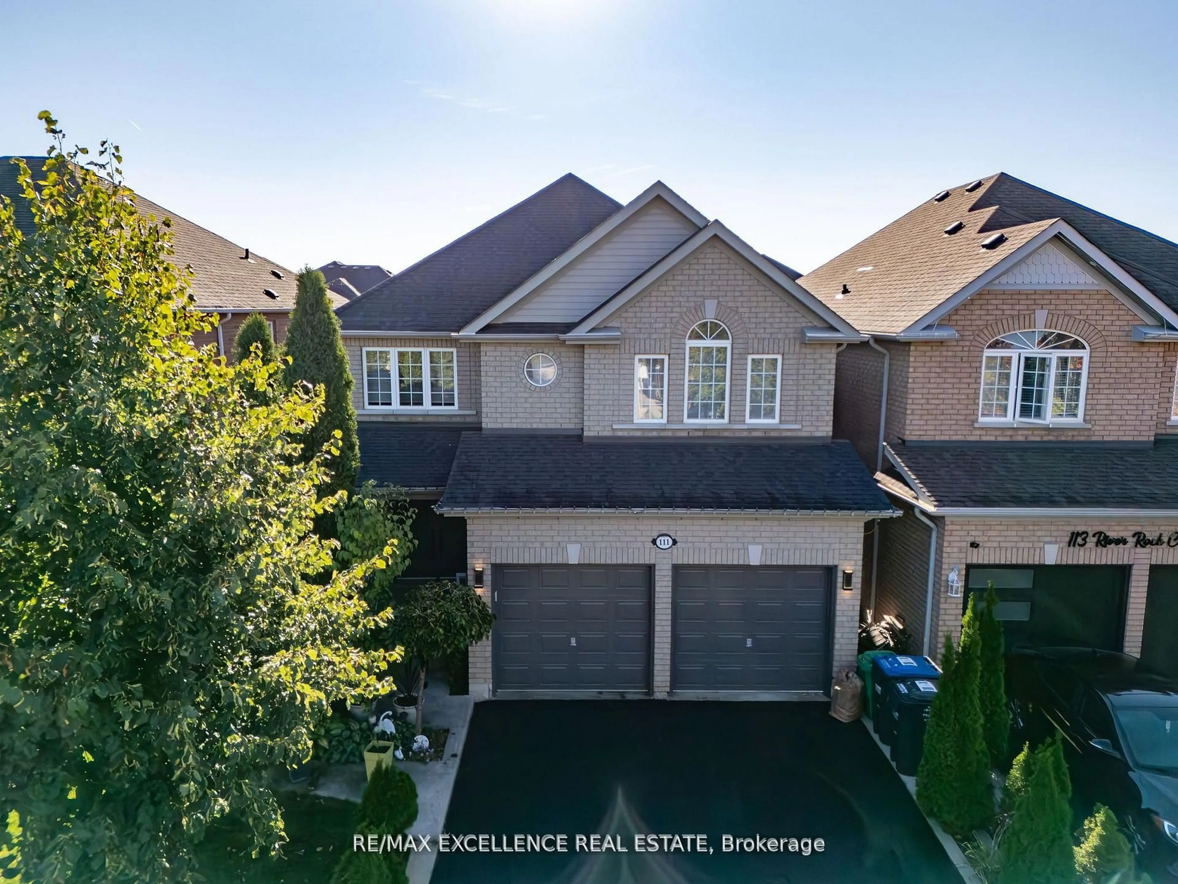 A pic from outside/outdoor area/front of a property/back of a property/a pic from drone, street for 111 River Rock Cres, Brampton Ontario L7A 2M4