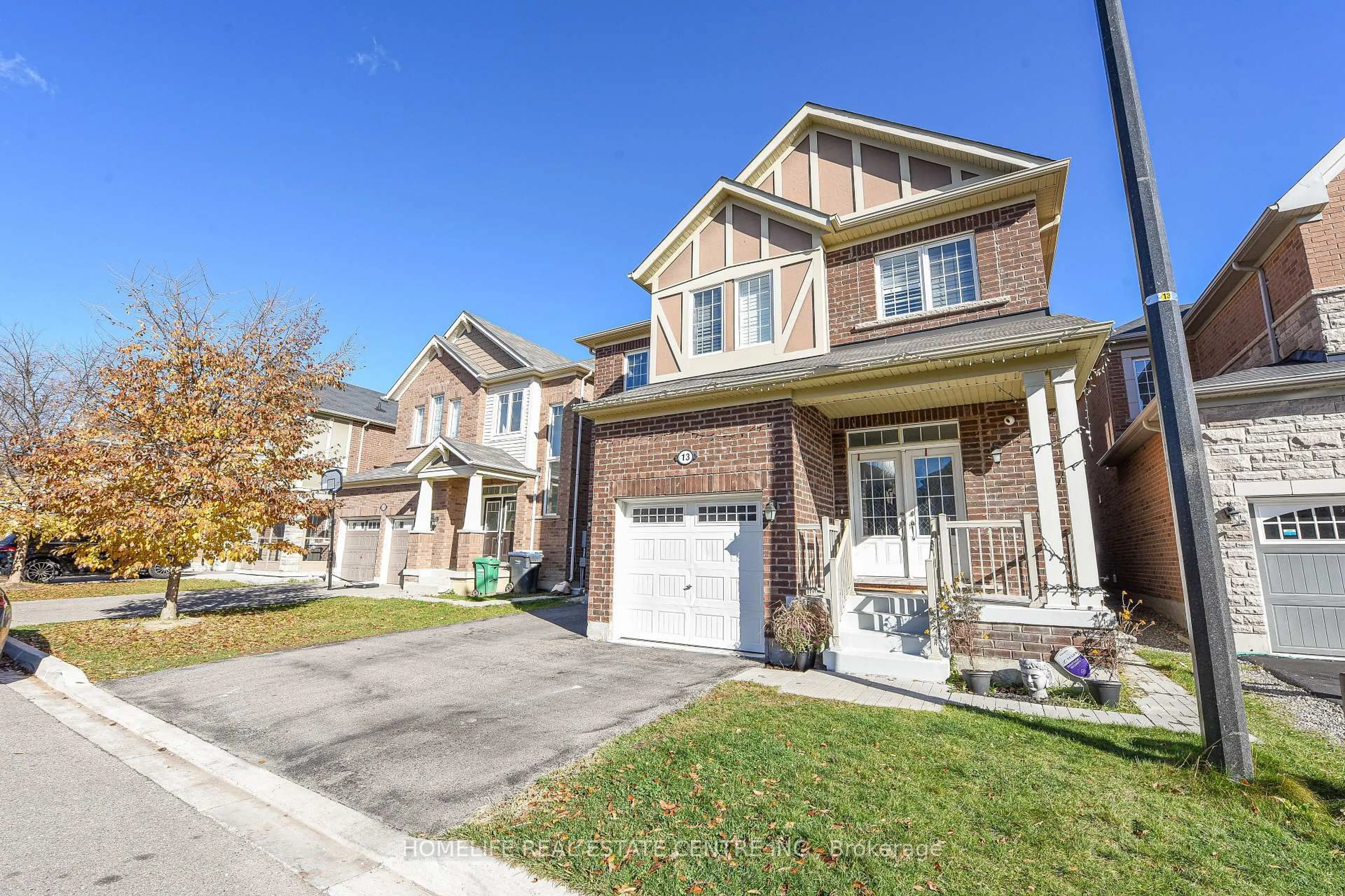 Home with brick exterior material, street for 13 Feeder St, Brampton Ontario L7A 4T7