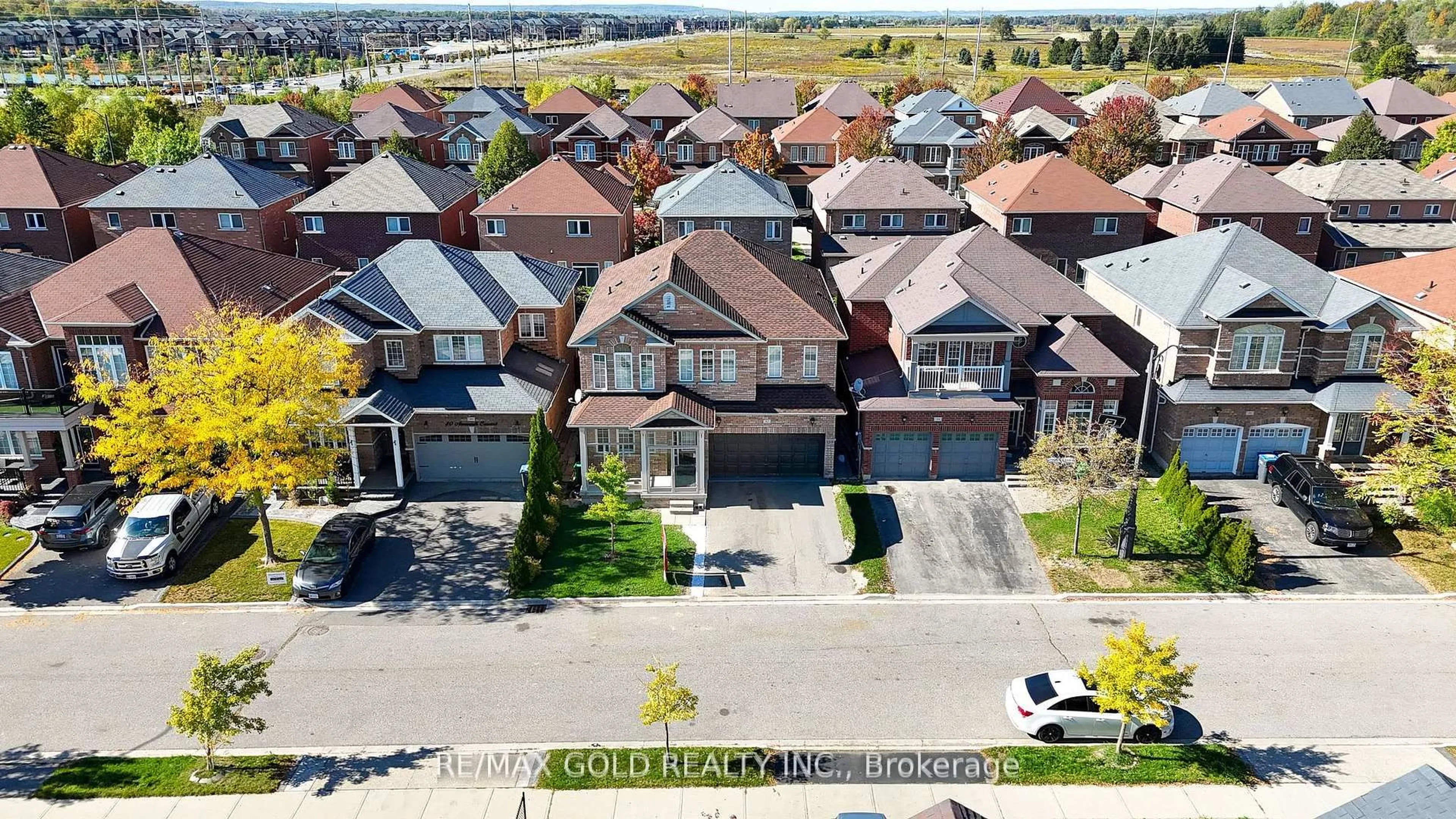 A pic from outside/outdoor area/front of a property/back of a property/a pic from drone, street for 82 Amaranth Cres, Brampton Ontario L7A 0L4