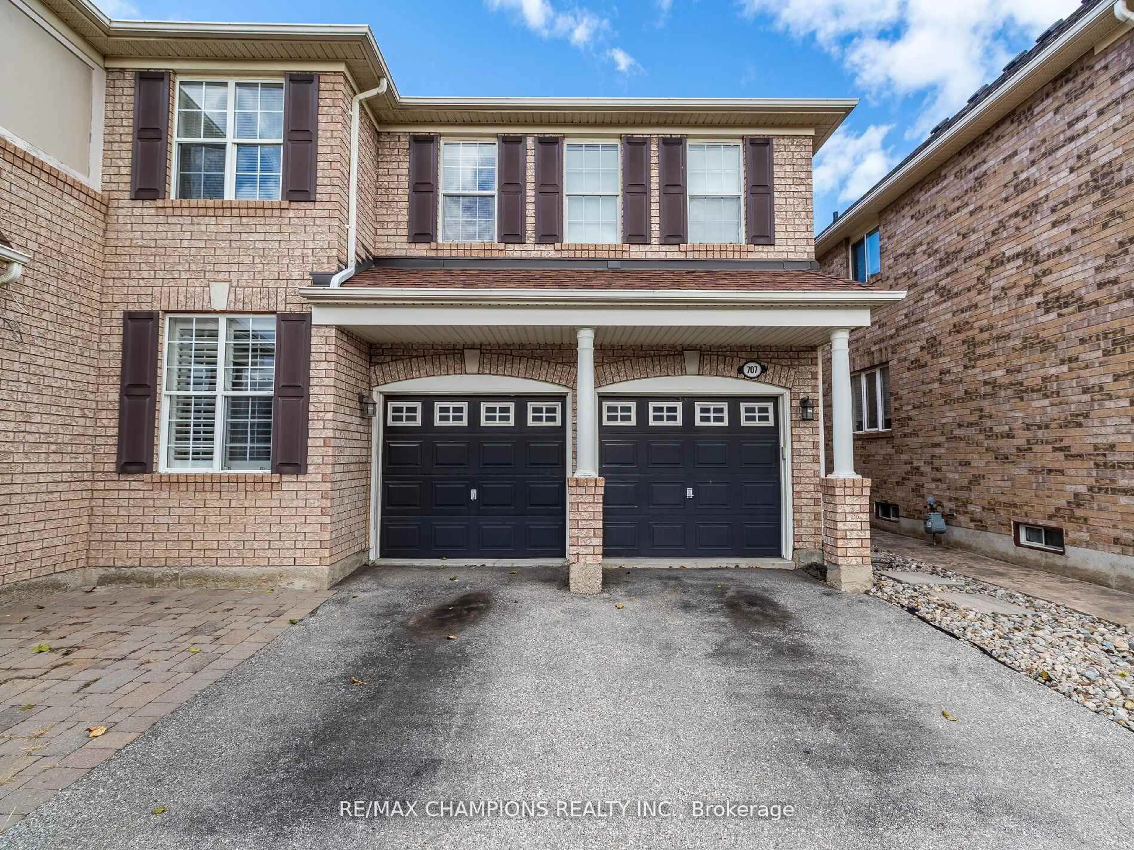 Home with brick exterior material, street for 707 Trudeau Dr, Milton Ontario L9T 5L4