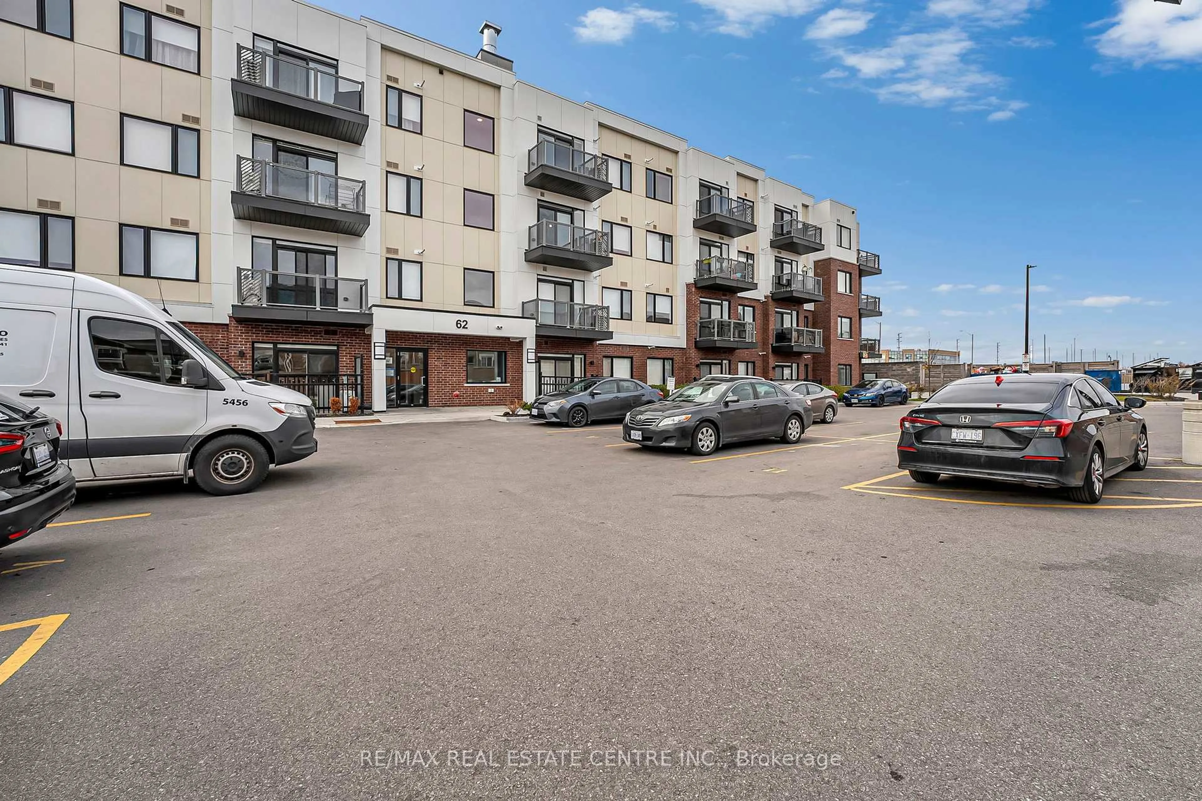 A pic from outside/outdoor area/front of a property/back of a property/a pic from drone, street for 62 Sky Harbour Dr #407, Brampton Ontario L6Y 6J2