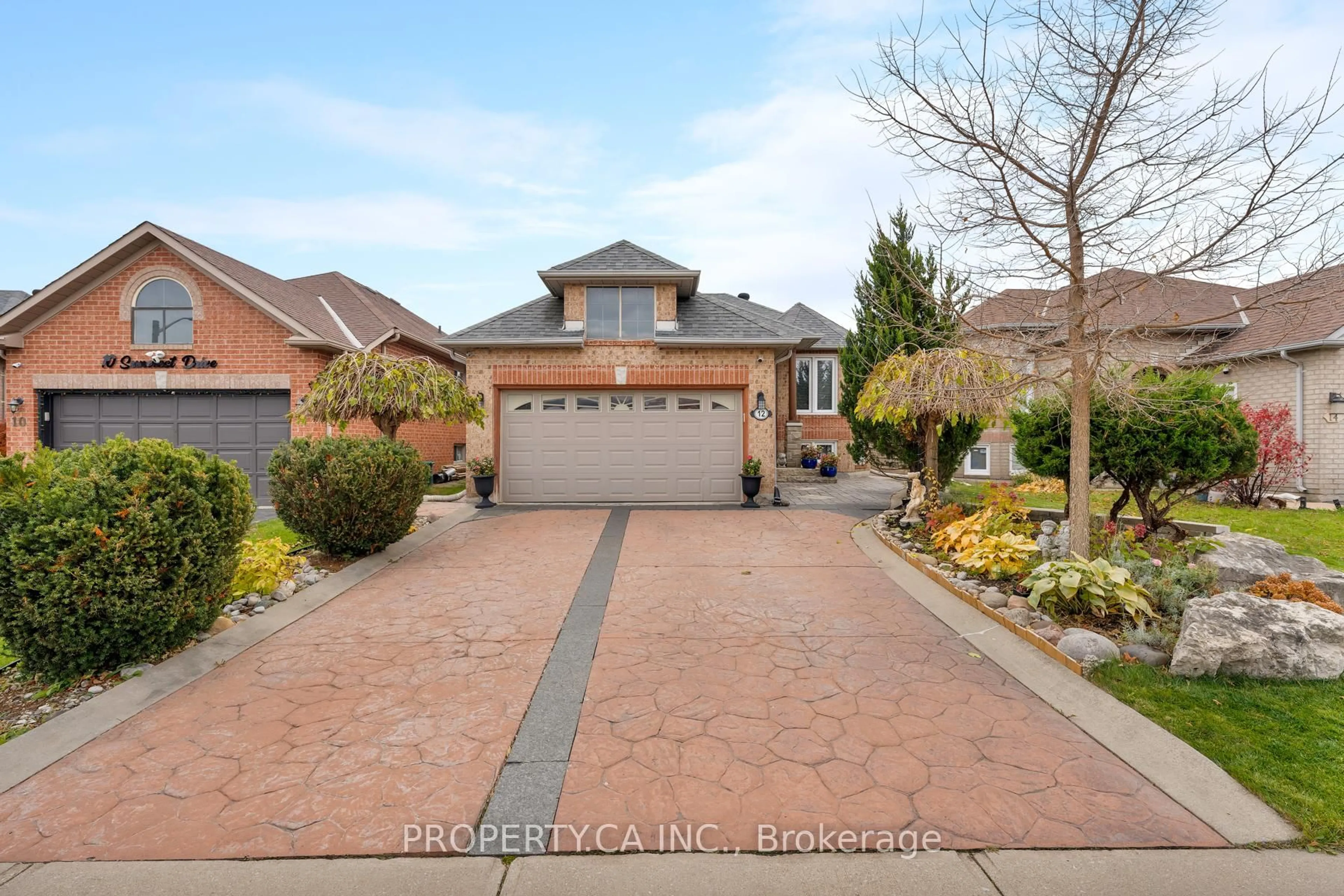 Home with brick exterior material, street for 12 Suncrest Dr, Brampton Ontario L6X 4L6