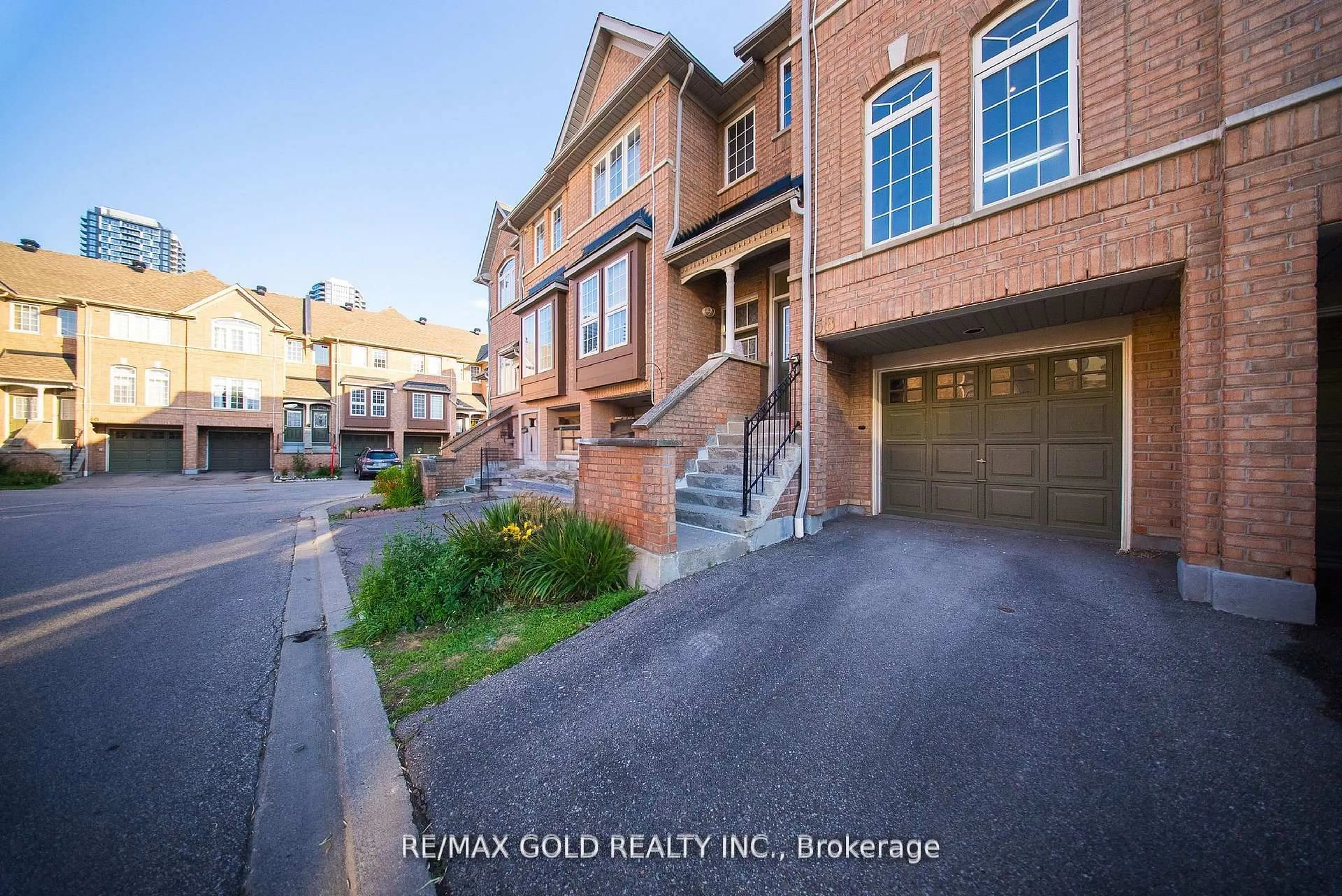 Home with brick exterior material, street for 50 Strathaven Dr #58, Mississauga Ontario L5R 4E7