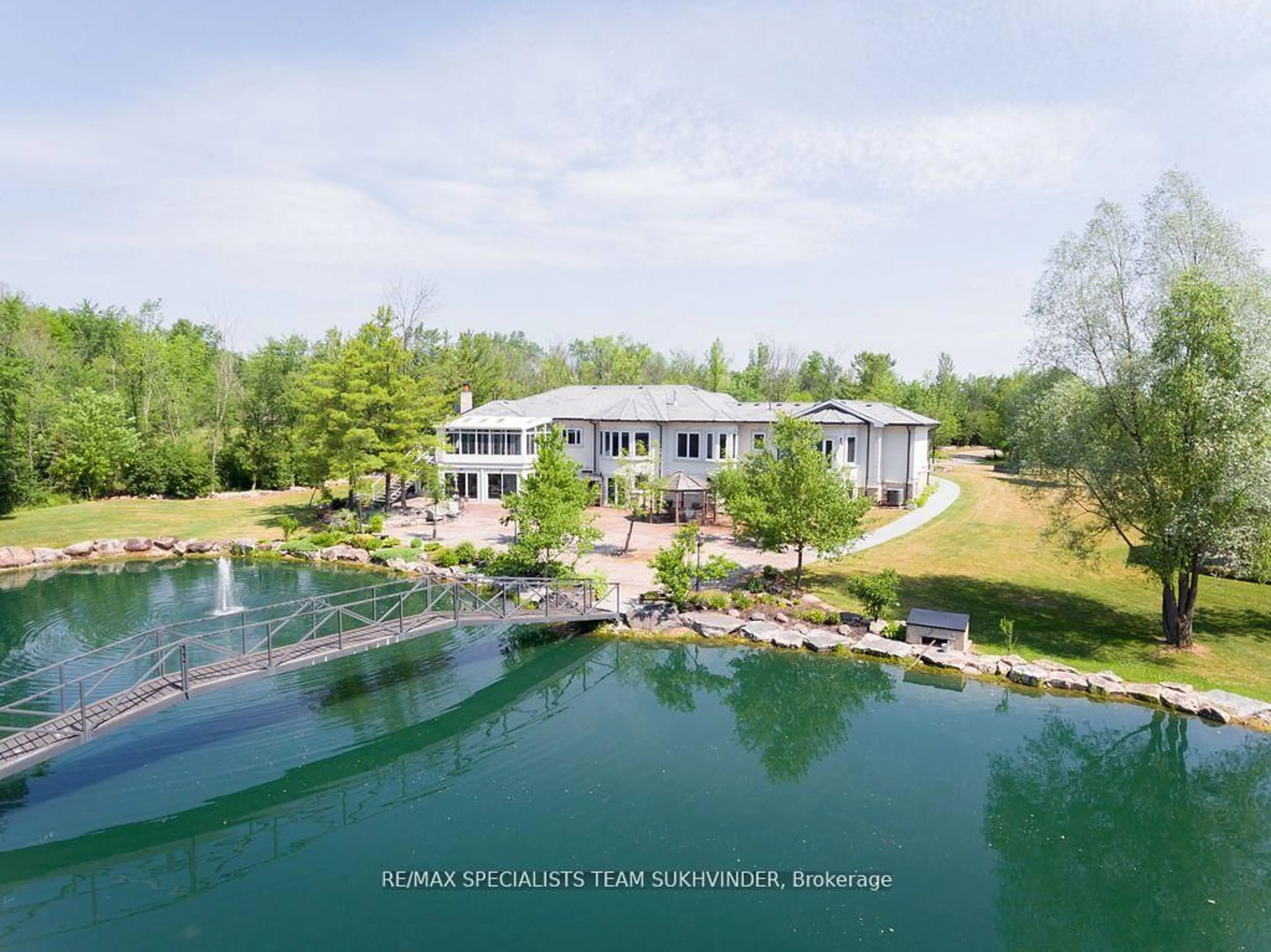 A pic from outside/outdoor area/front of a property/back of a property/a pic from drone, water/lake/river/ocean view for 14180 Heritage Rd, Caledon Ontario L7C 1T6