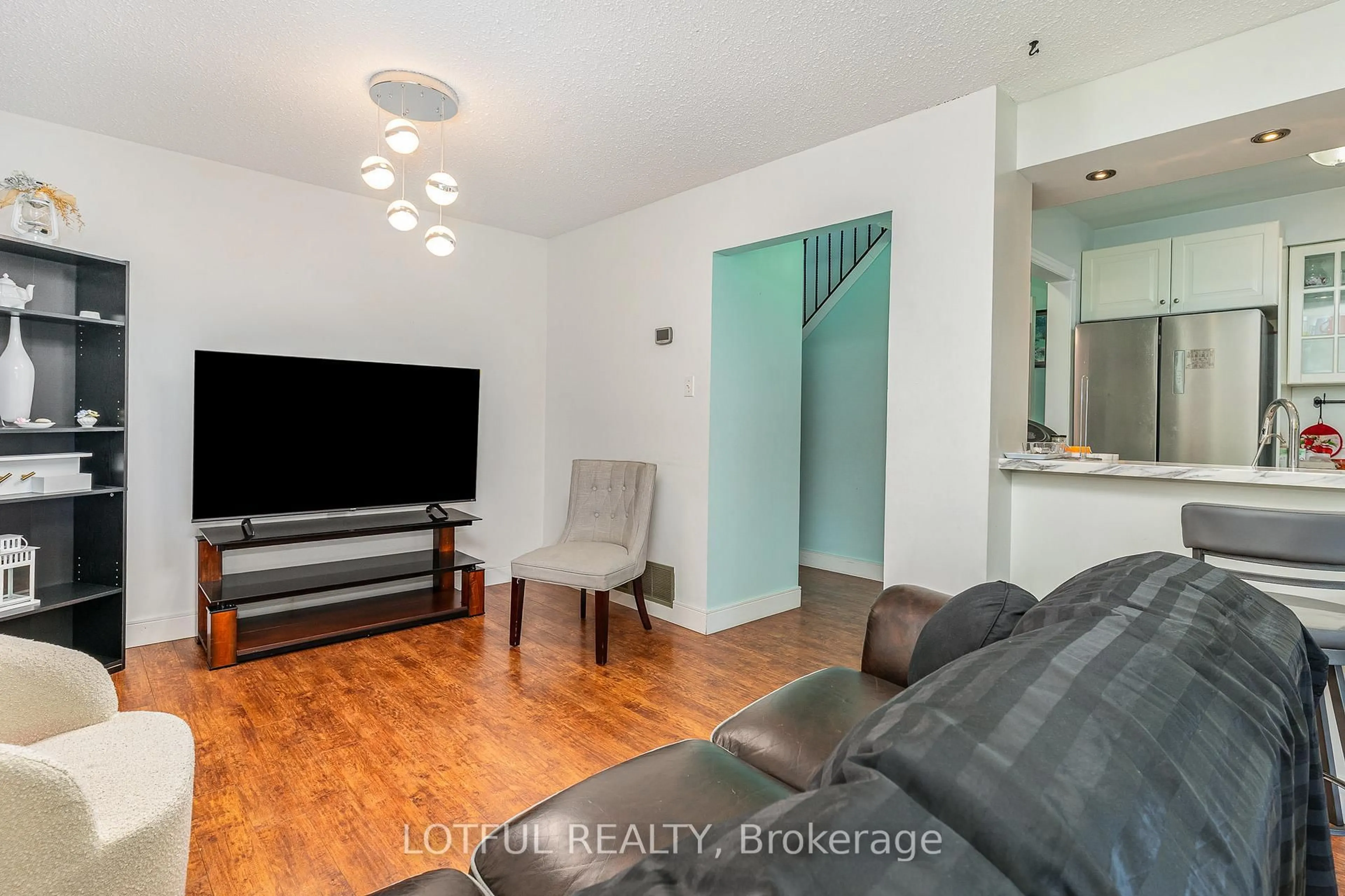 Living room with furniture, unknown for 134 Royal Salisbury Way, Brampton Ontario L6V 3J8