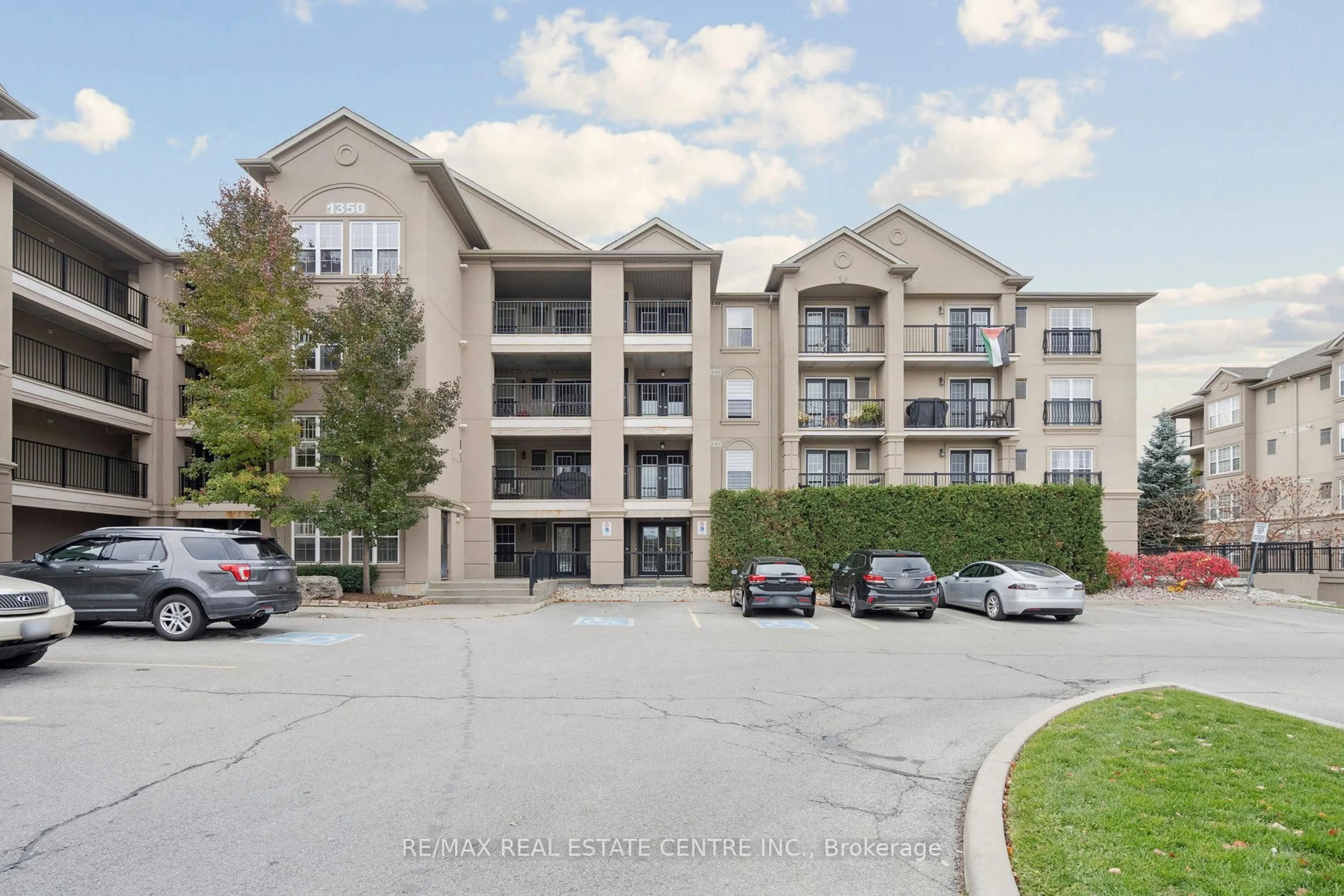 A pic from outside/outdoor area/front of a property/back of a property/a pic from drone, unknown for 1350 Main St #408, Milton Ontario L9T 7S7