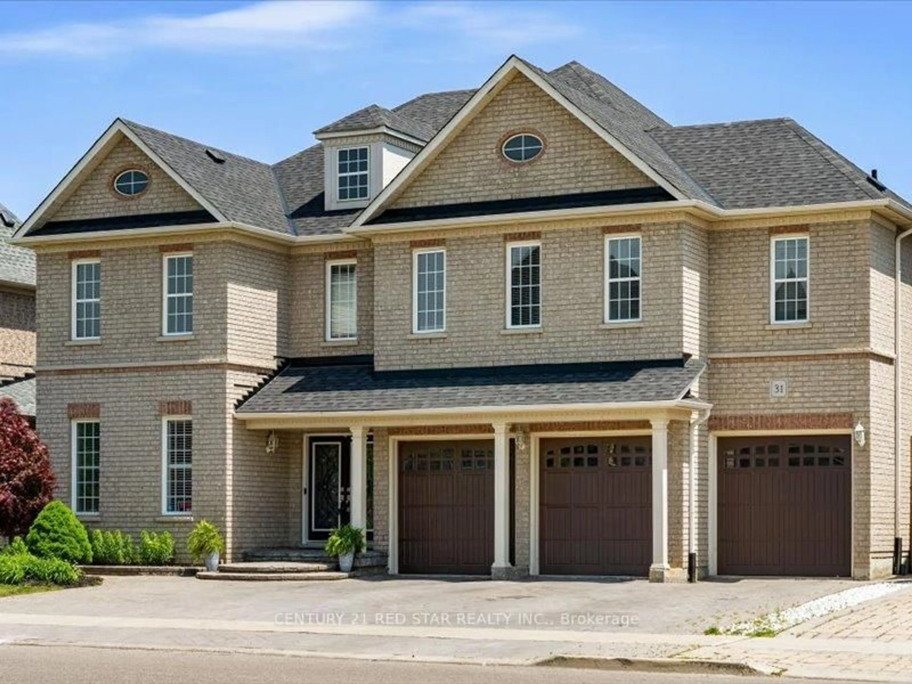 Home with brick exterior material, street for 31 Eiffel Blvd, Brampton Ontario L6P 1V9