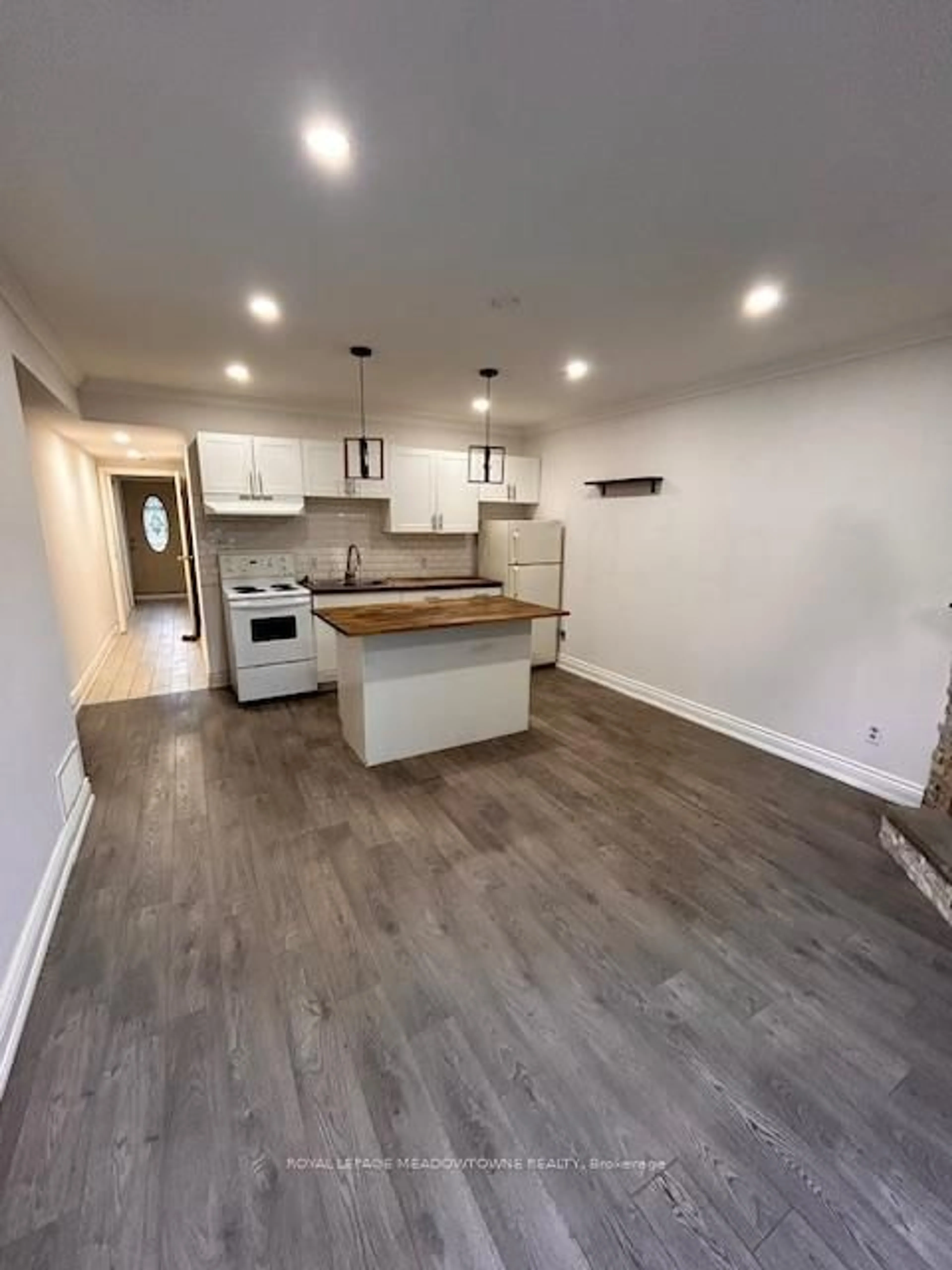 Open concept kitchen, wood/laminate floor for 161 Harold St, Brampton Ontario L6Y 2G3
