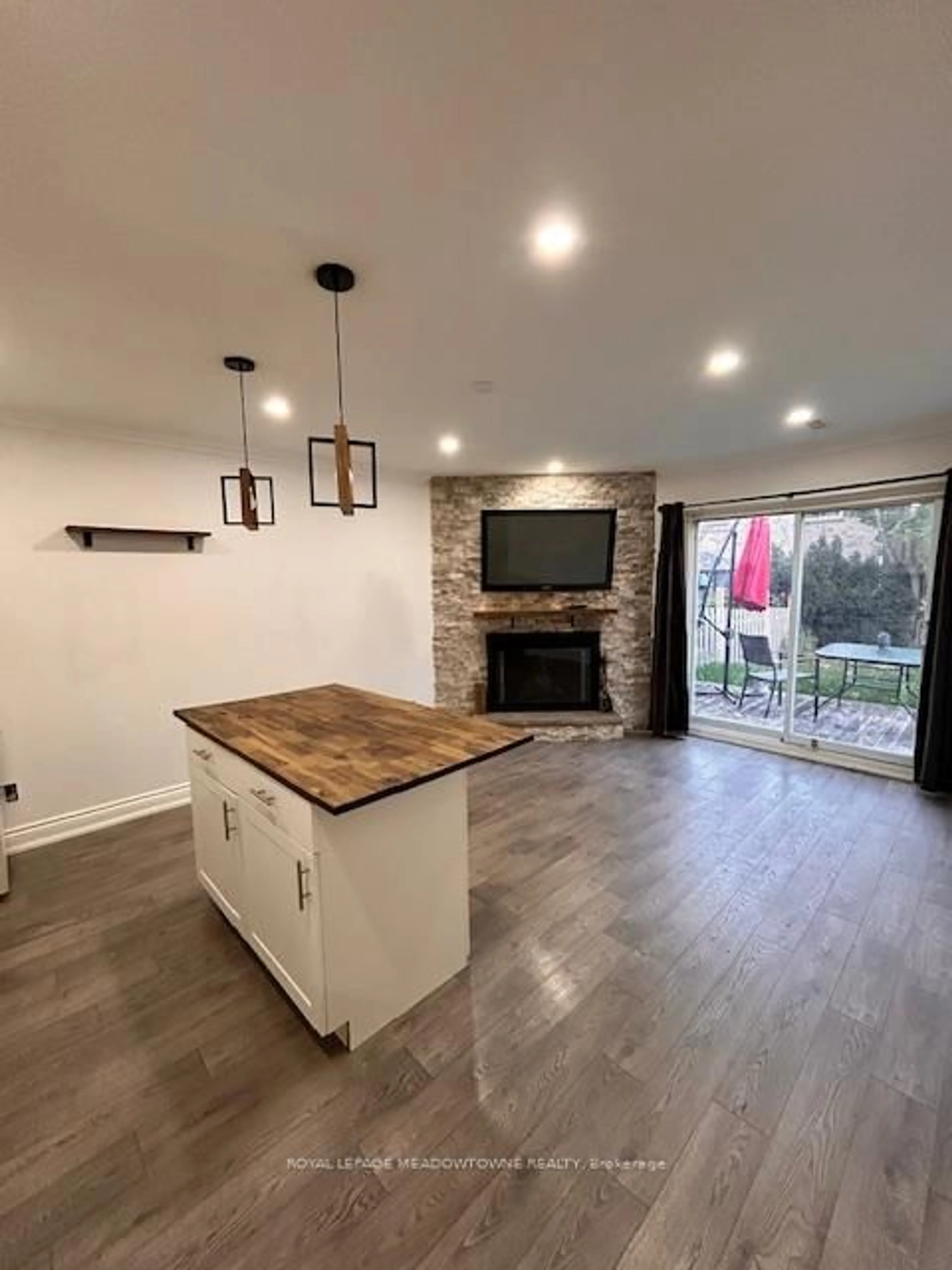 Open concept kitchen, wood/laminate floor for 161 Harold St, Brampton Ontario L6Y 2G3