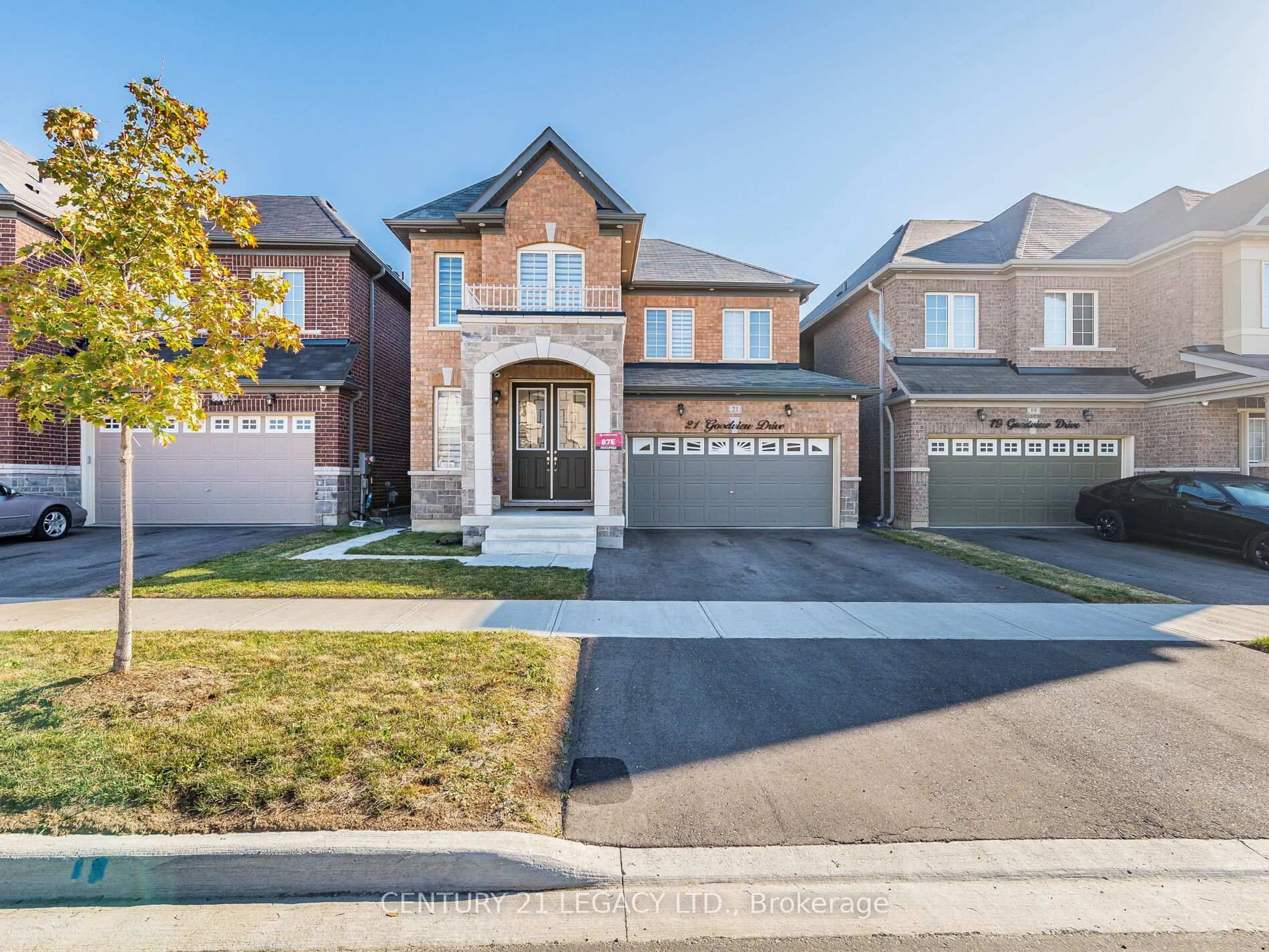 Home with brick exterior material, street for 21 Goodview Dr, Brampton Ontario L6R 4C3