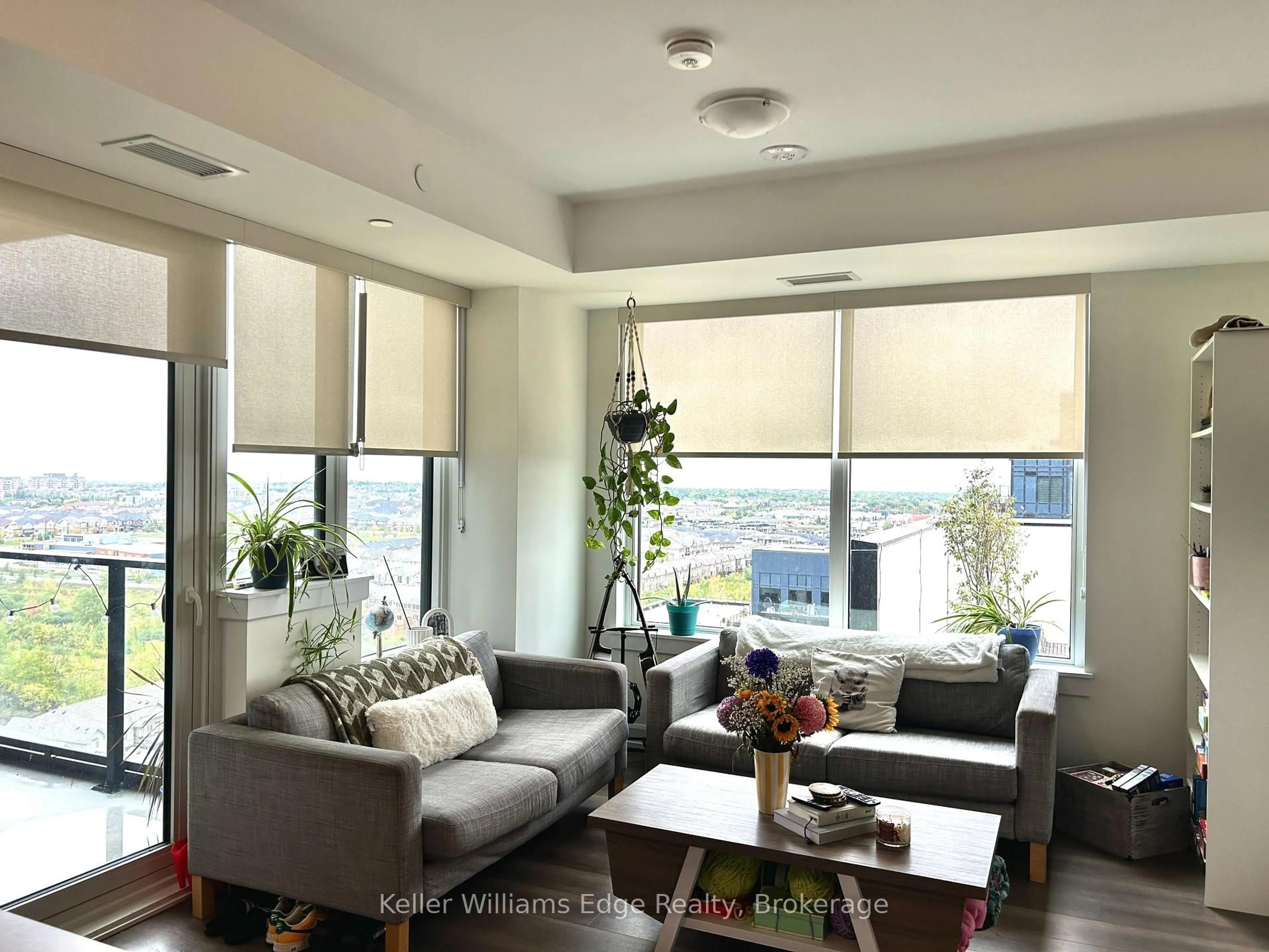 Living room with furniture, unknown for 3220 William Coltson Ave #1401, Oakville Ontario L6H 7X9