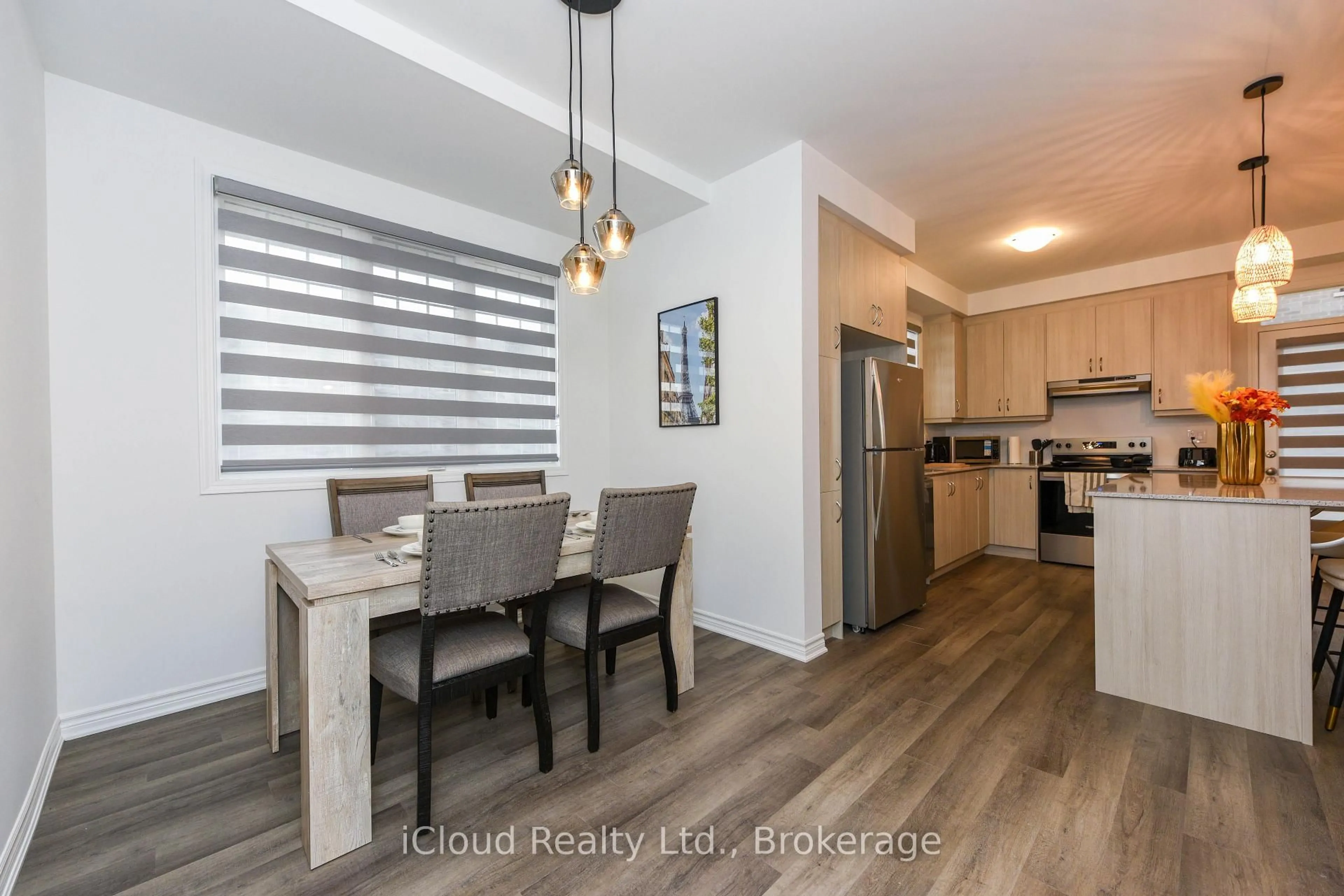 Open concept kitchen, wood/laminate floor for 1217 Ferguson Dr, Milton Ontario L9T 7V8