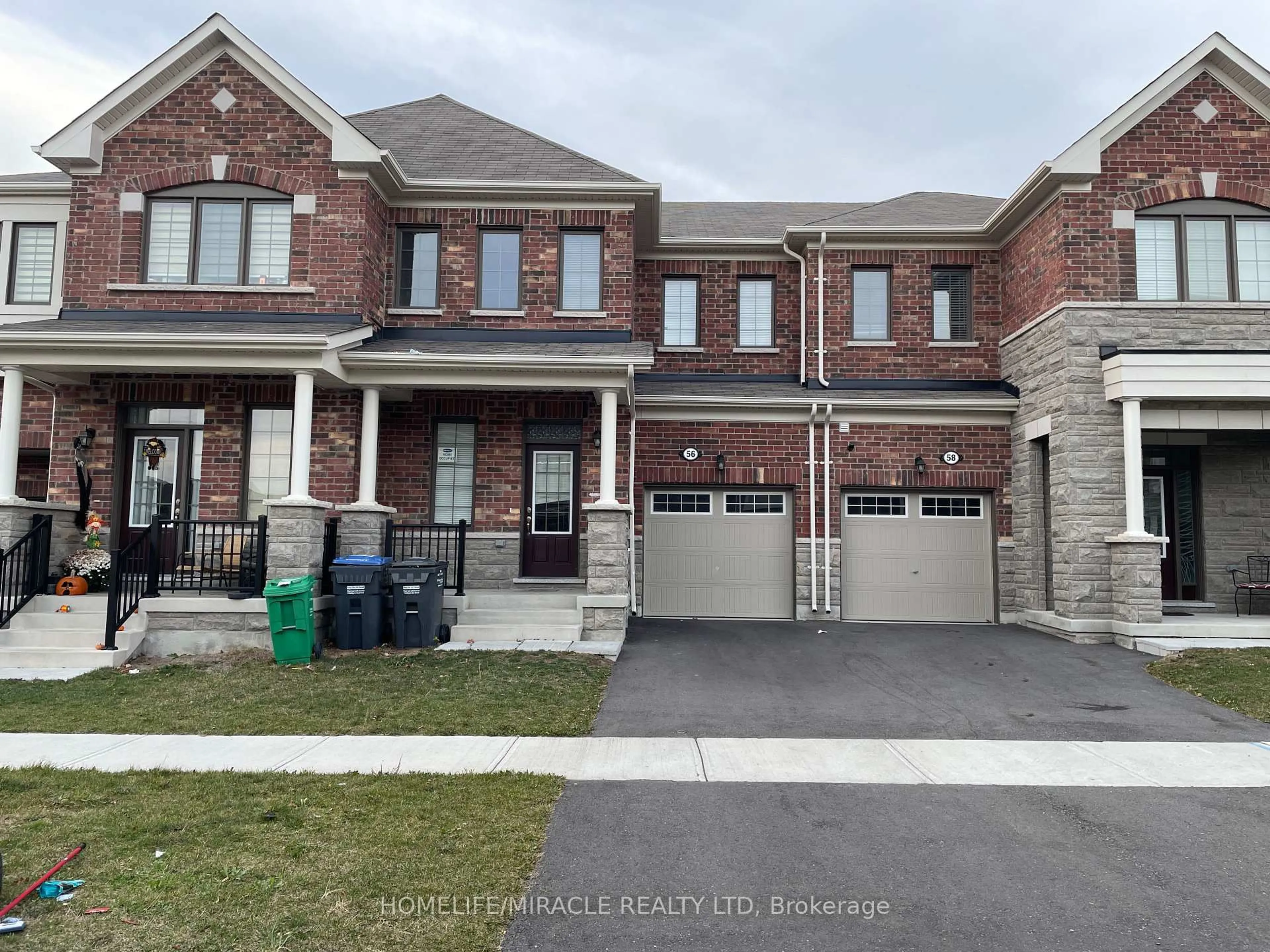 Home with brick exterior material, street for 56 Circus Cres, Brampton Ontario L7A 5E3