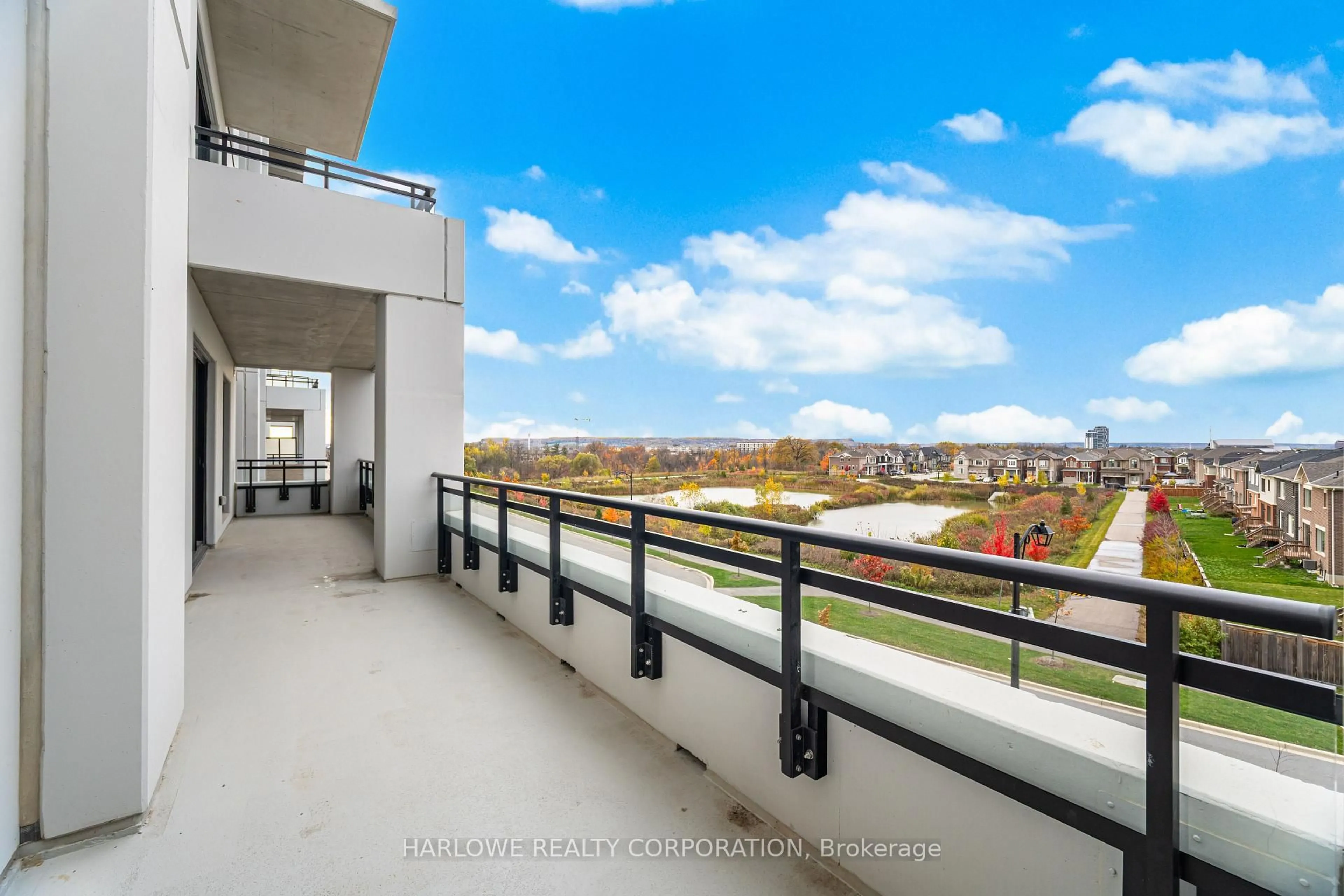 Balcony in the apartment, city buildings view from balcony for 720 Whitlock Ave #317, Milton Ontario L9E 2B5