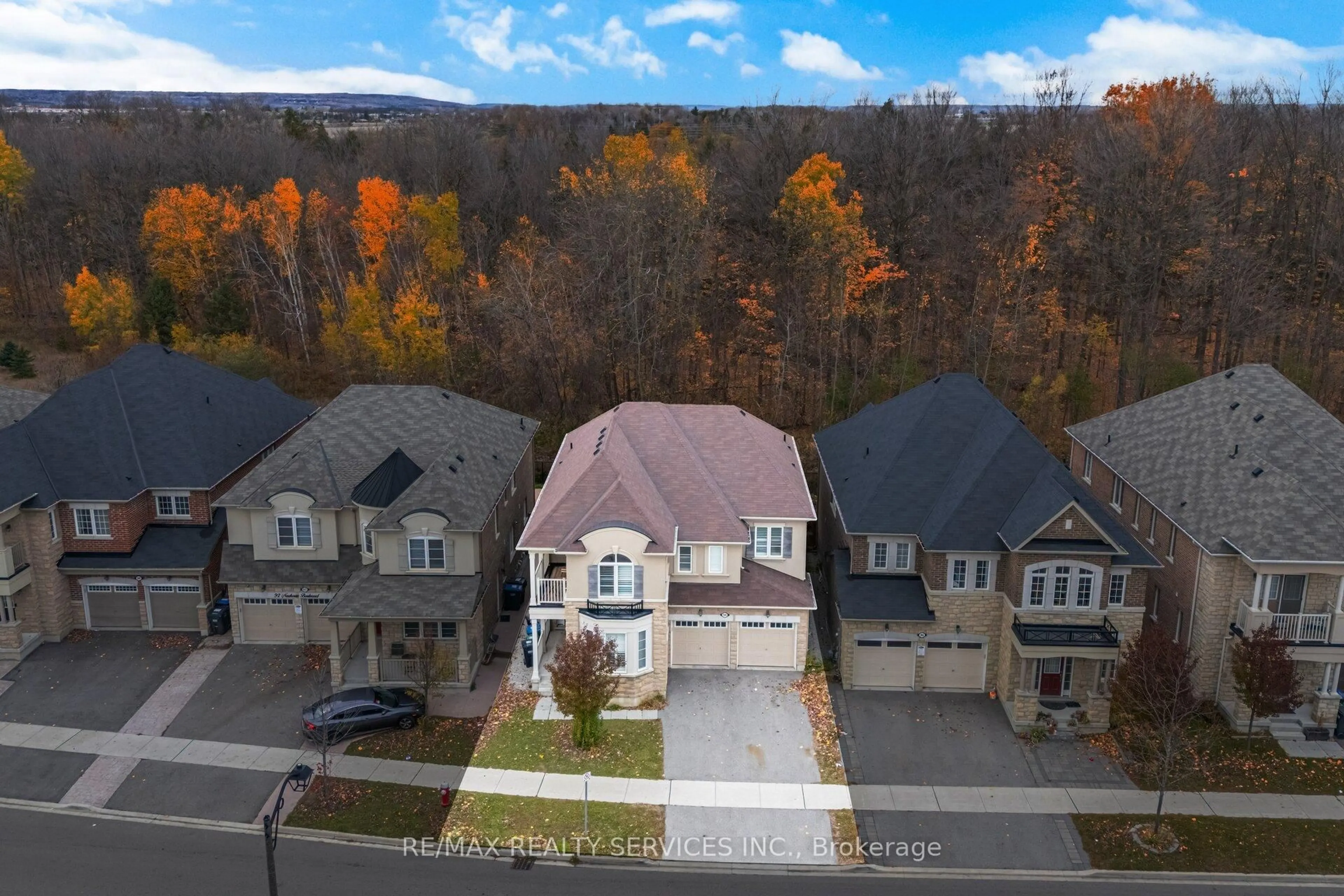 A pic from outside/outdoor area/front of a property/back of a property/a pic from drone, street for 94 Newhouse Blvd, Caledon Ontario L7C 4E4