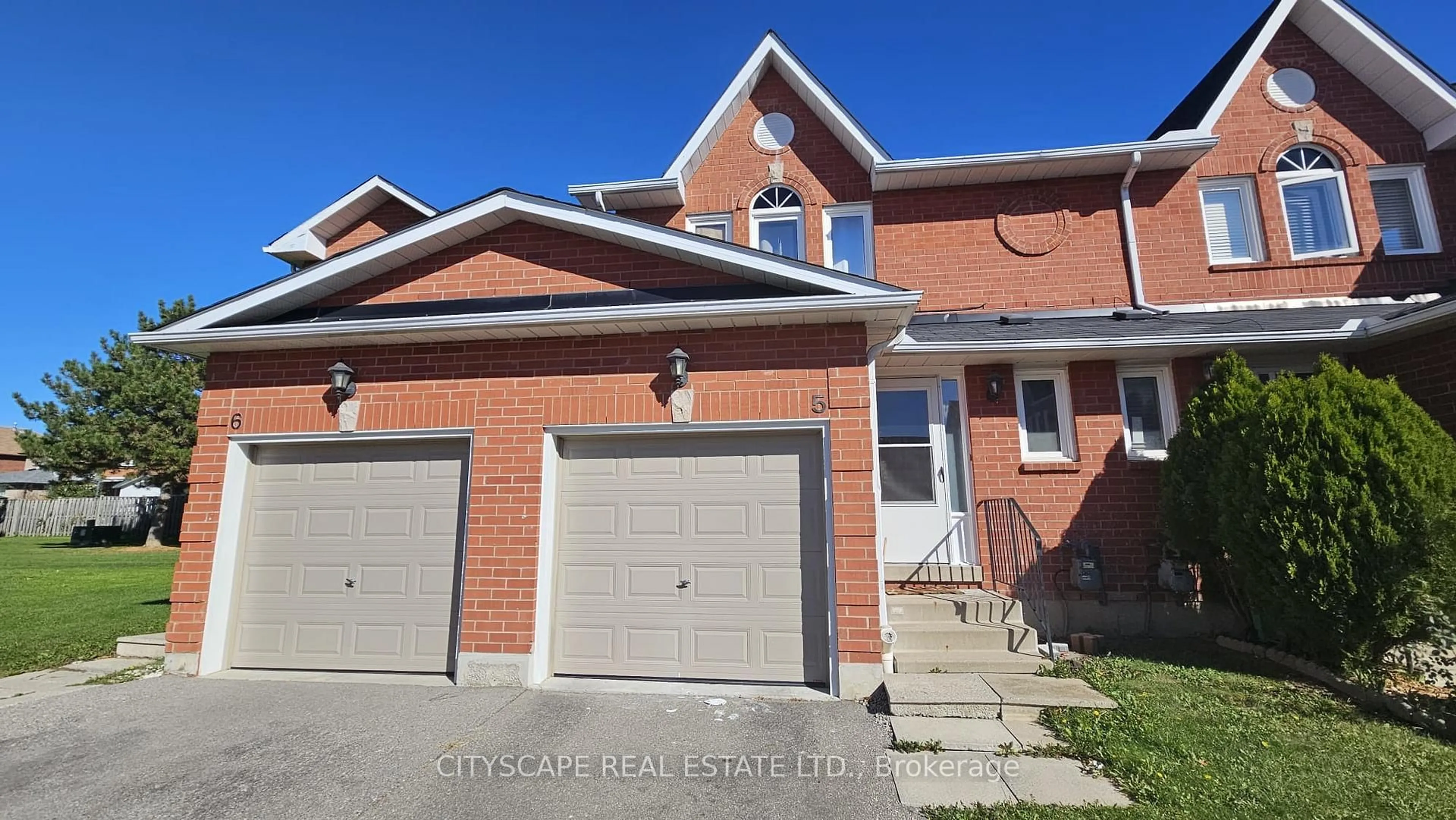 Home with brick exterior material, street for 1485 Torrington Dr #Unit 5, Mississauga Ontario L5V 1Y3