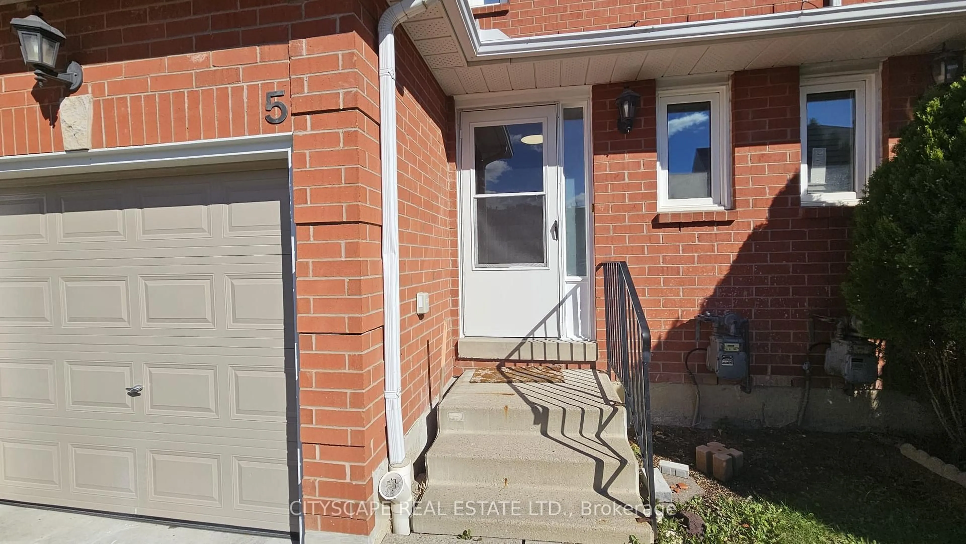 Home with brick exterior material, street for 1485 Torrington Dr #Unit 5, Mississauga Ontario L5V 1Y3