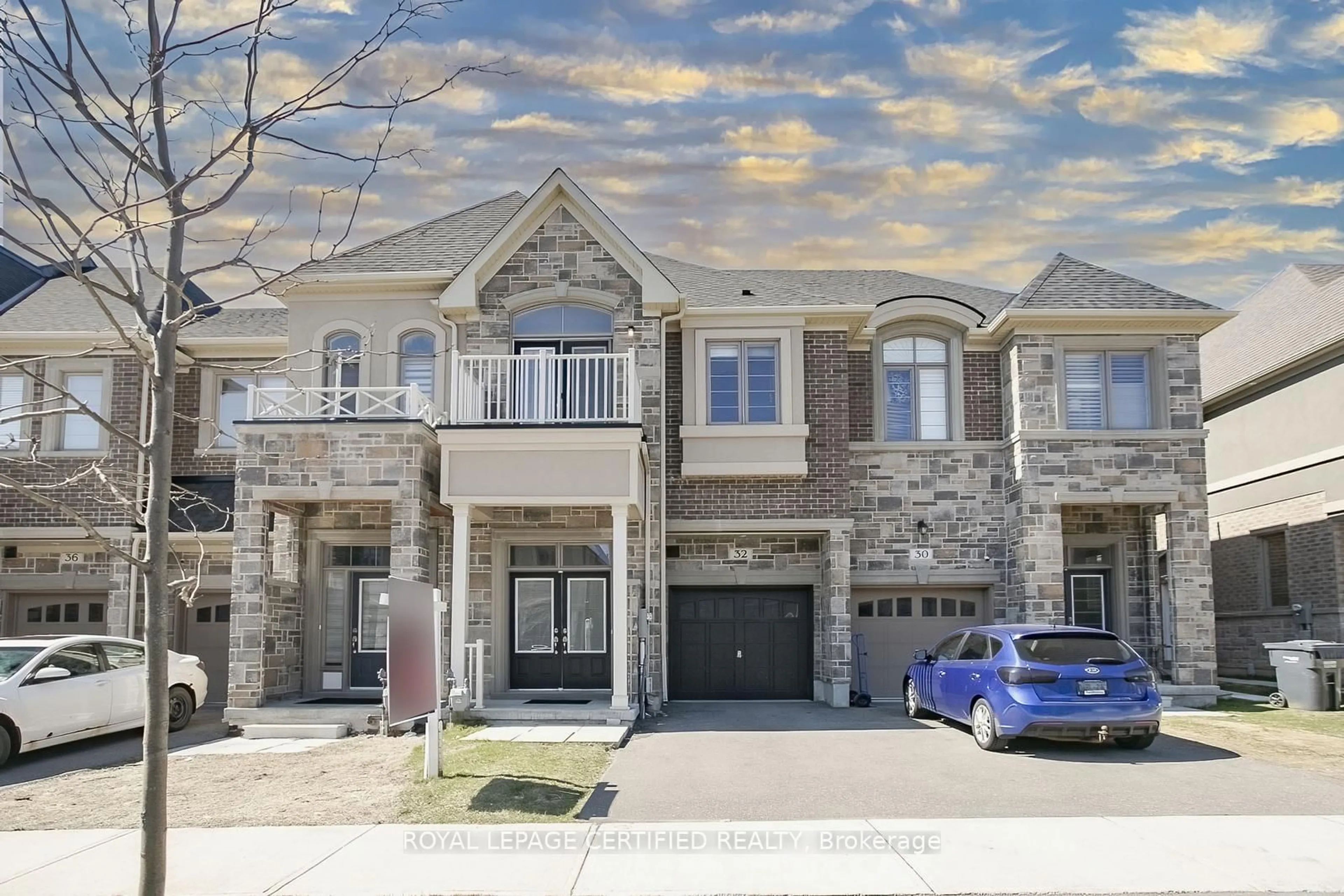Home with brick exterior material, street for 32 Dalbeattie Dr, Brampton Ontario L6Y 6H6