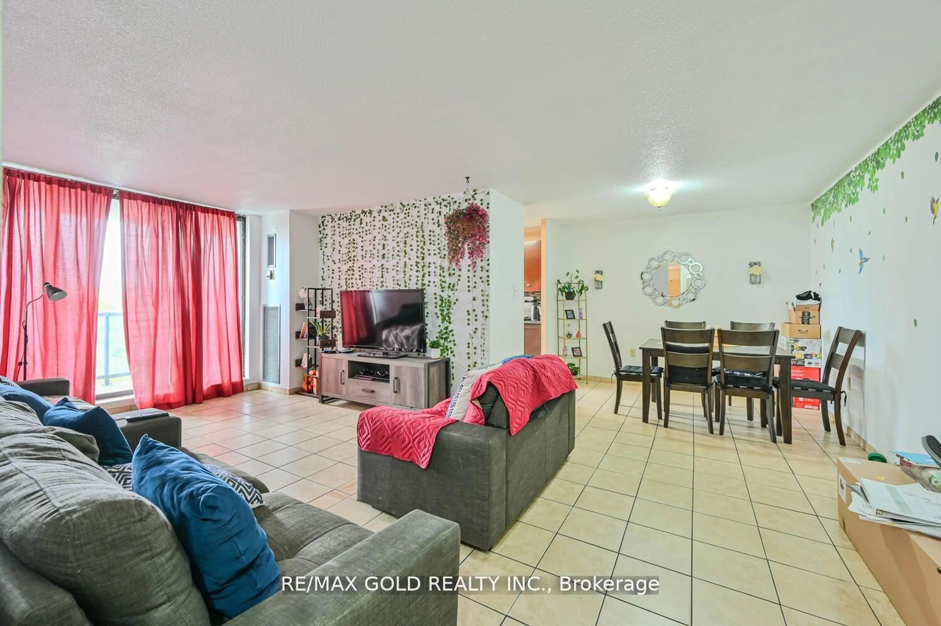 Living room with furniture, unknown for 21 Knightsbridge Rd #403, Brampton Ontario L6T 3Y1