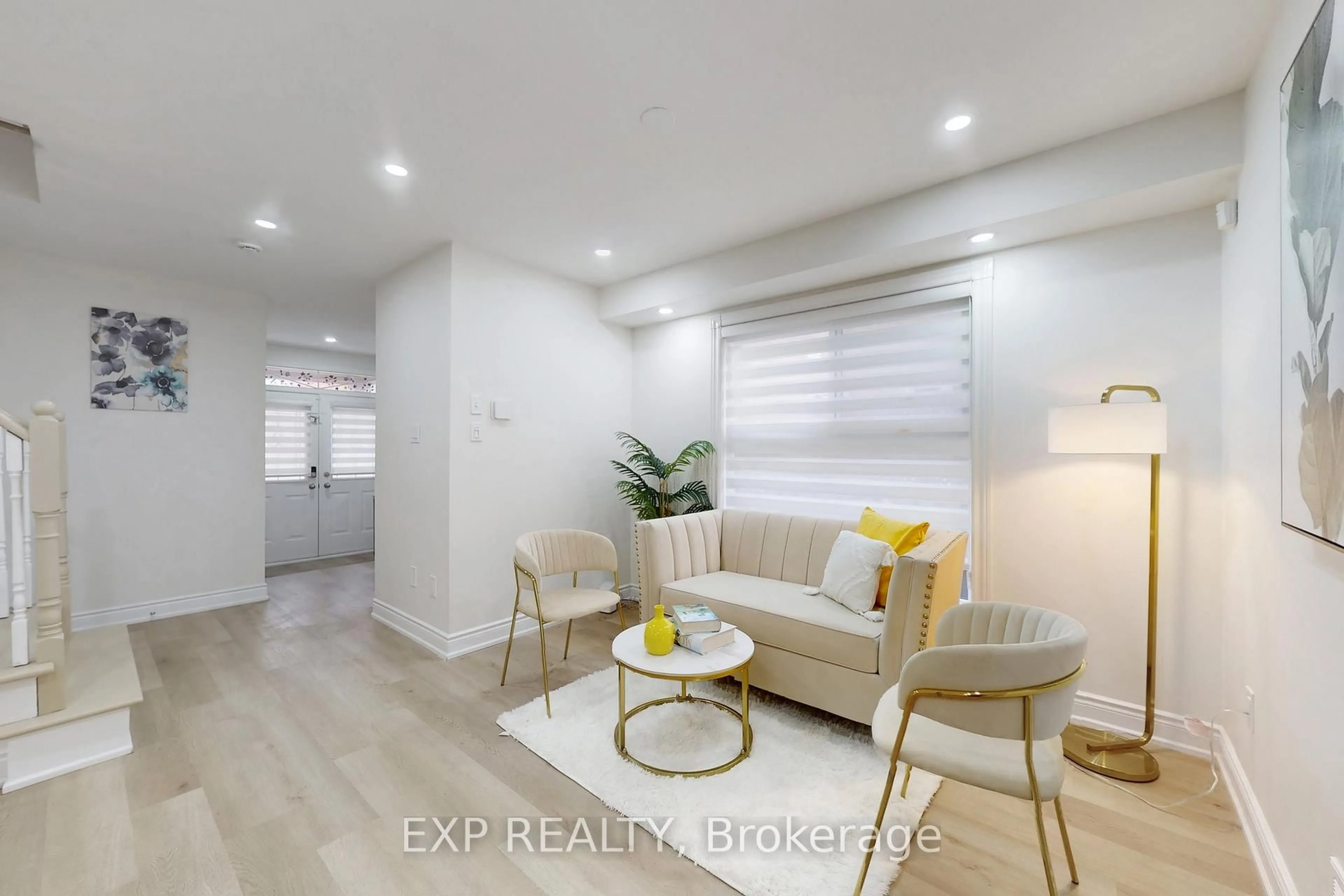 Living room with furniture, wood/laminate floor for 306 Morningmist St, Brampton Ontario L6R 2B9