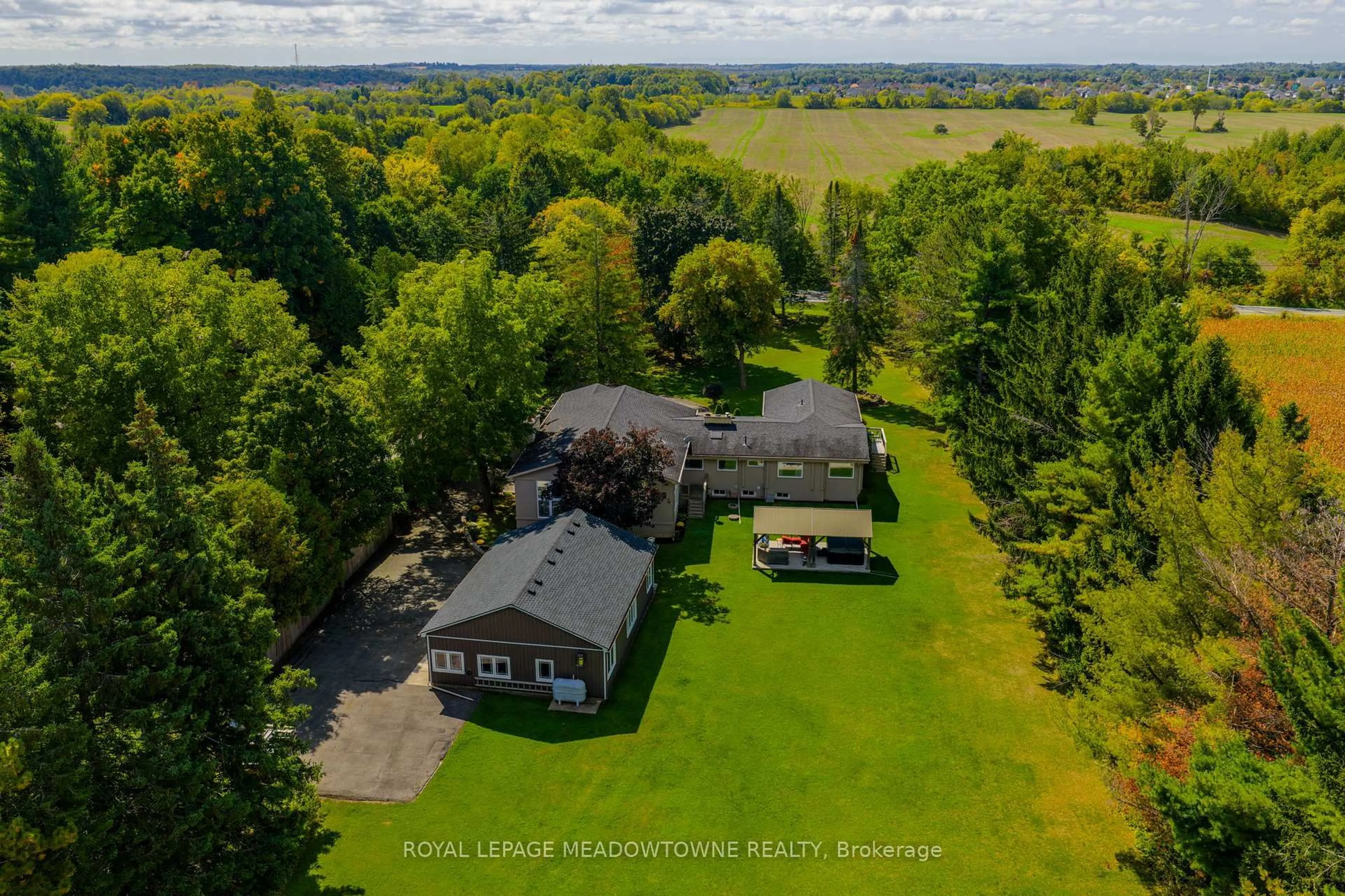 A pic from outside/outdoor area/front of a property/back of a property/a pic from drone, water/lake/river/ocean view for 13219 Fourth Line, Halton Hills Ontario L7J 2M1