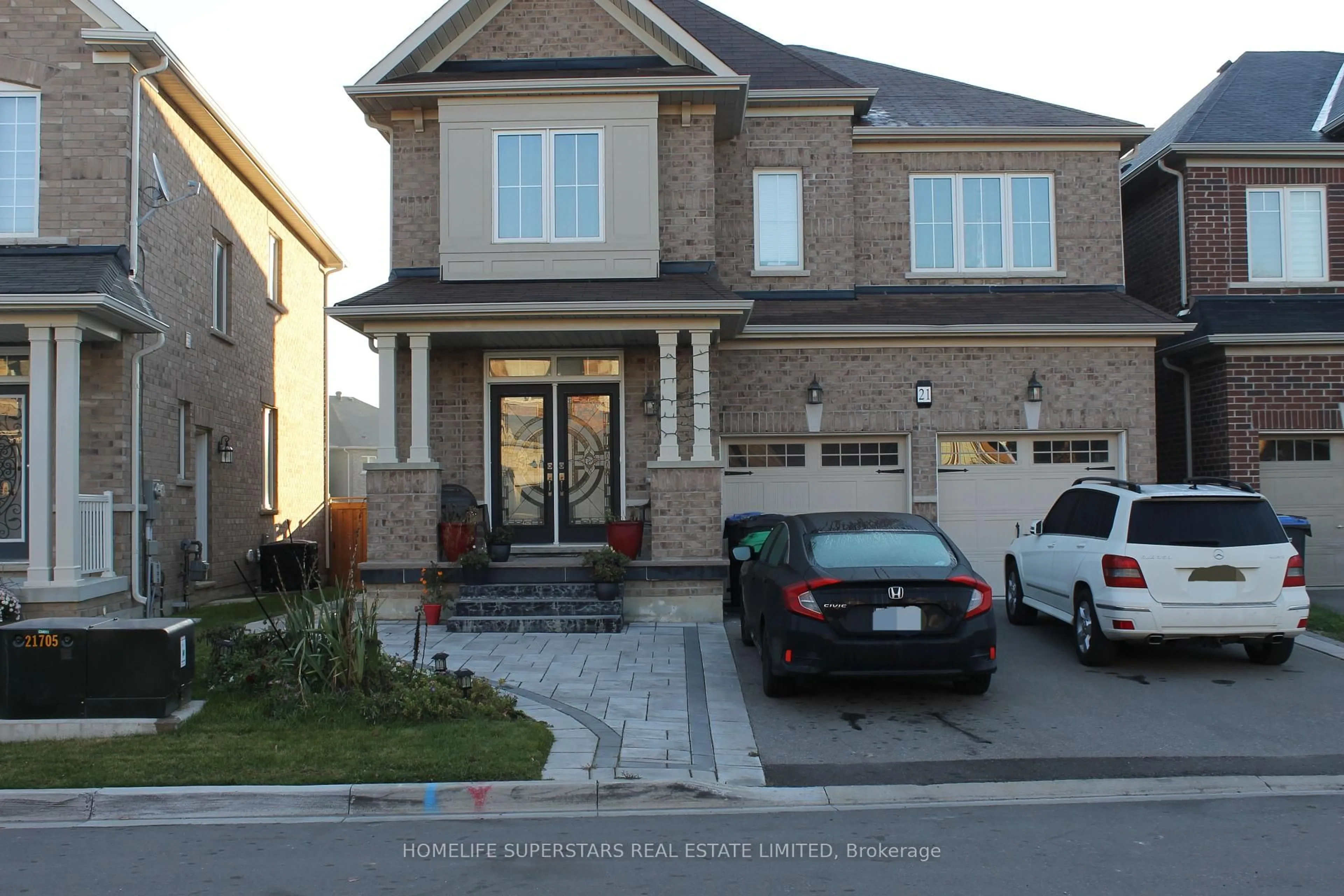 Home with brick exterior material, street for 21 Iguana Tr, Brampton Ontario L7A 4N2