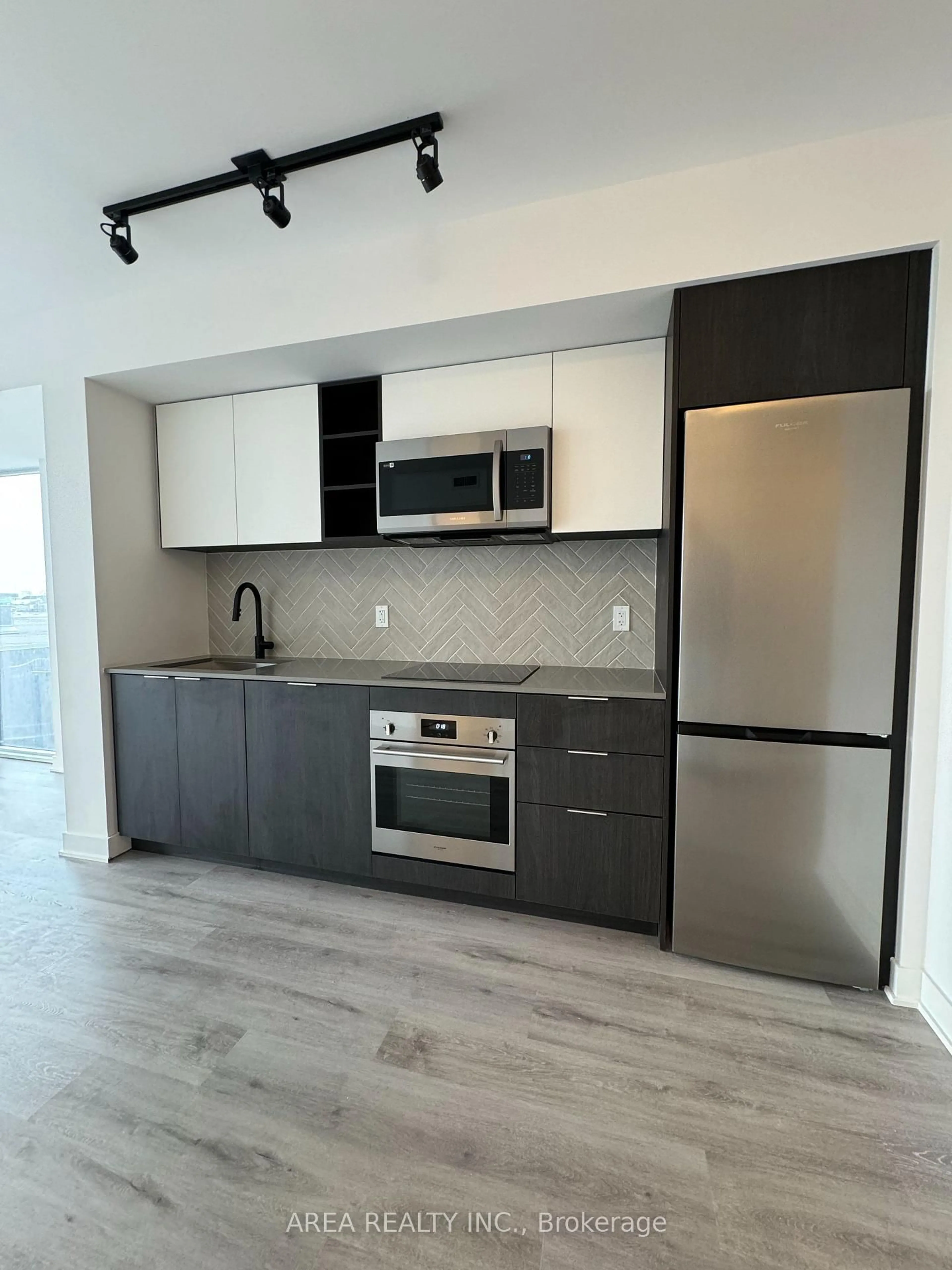 Open concept kitchen, unknown for 36 Zorra St #303, Toronto Ontario M8Z 0G5
