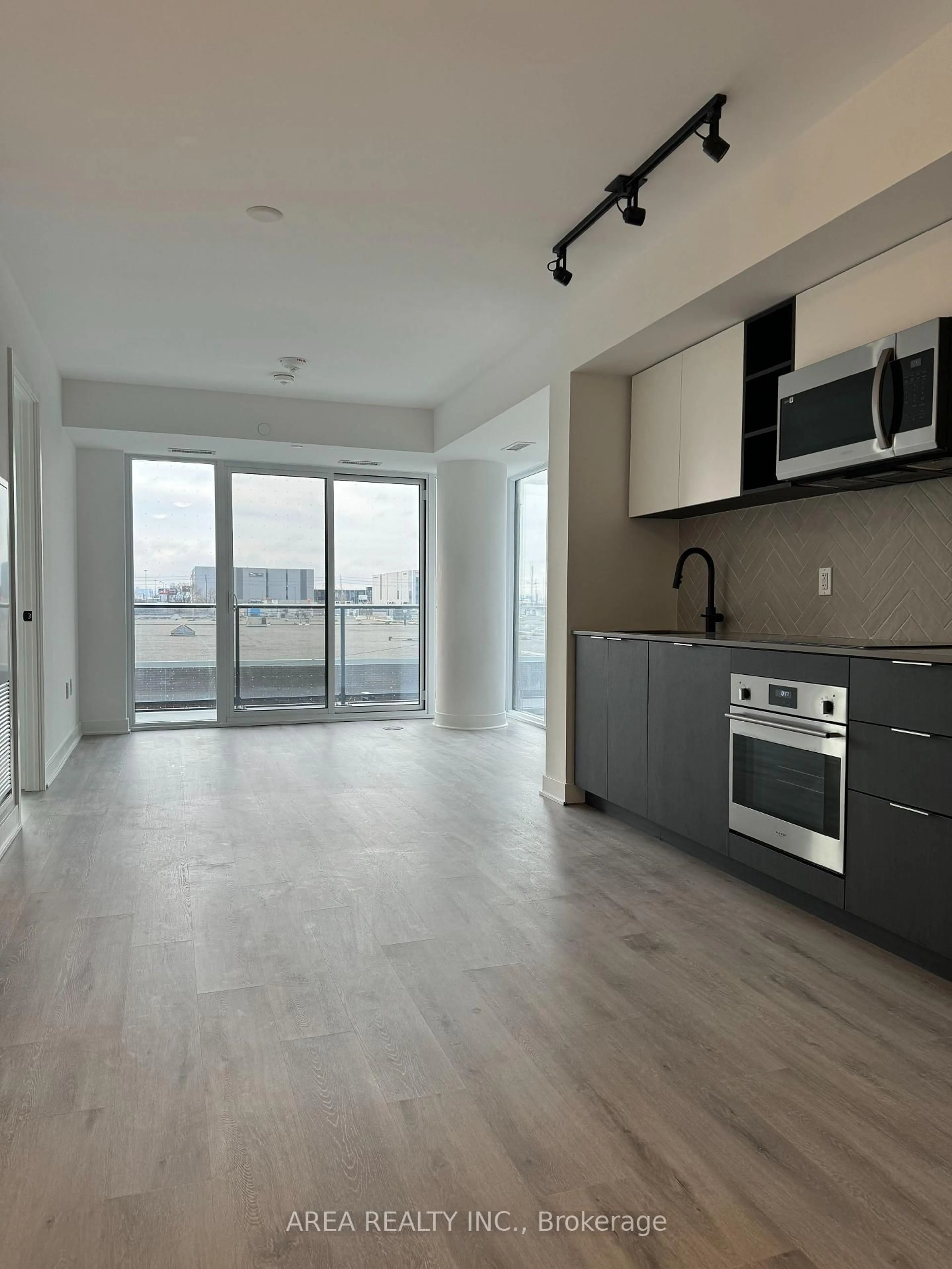 Open concept kitchen, unknown for 36 Zorra St #303, Toronto Ontario M8Z 0G5