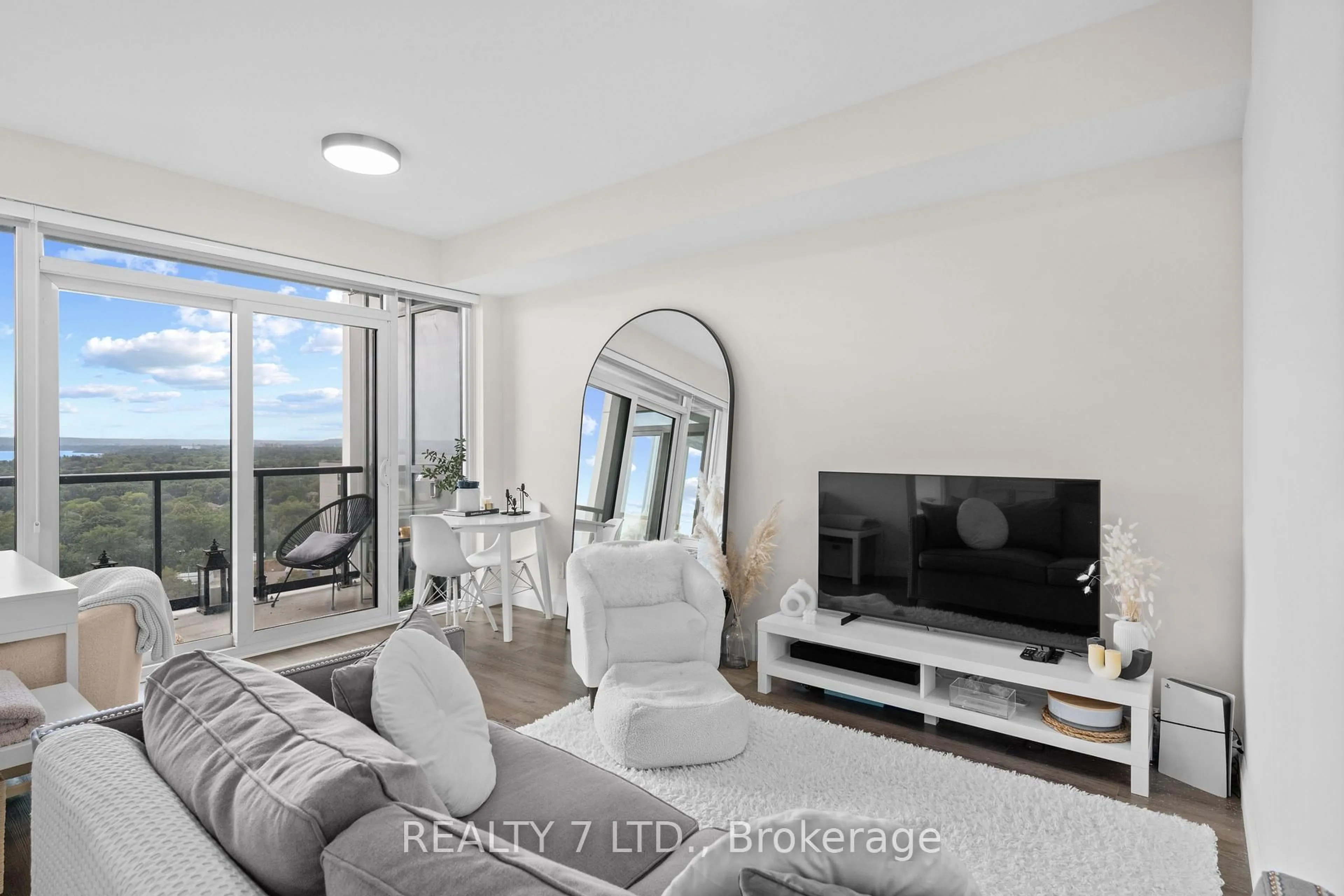 Living room with furniture, unknown for 500 Brock Ave #1701, Burlington Ontario L7S 0A5