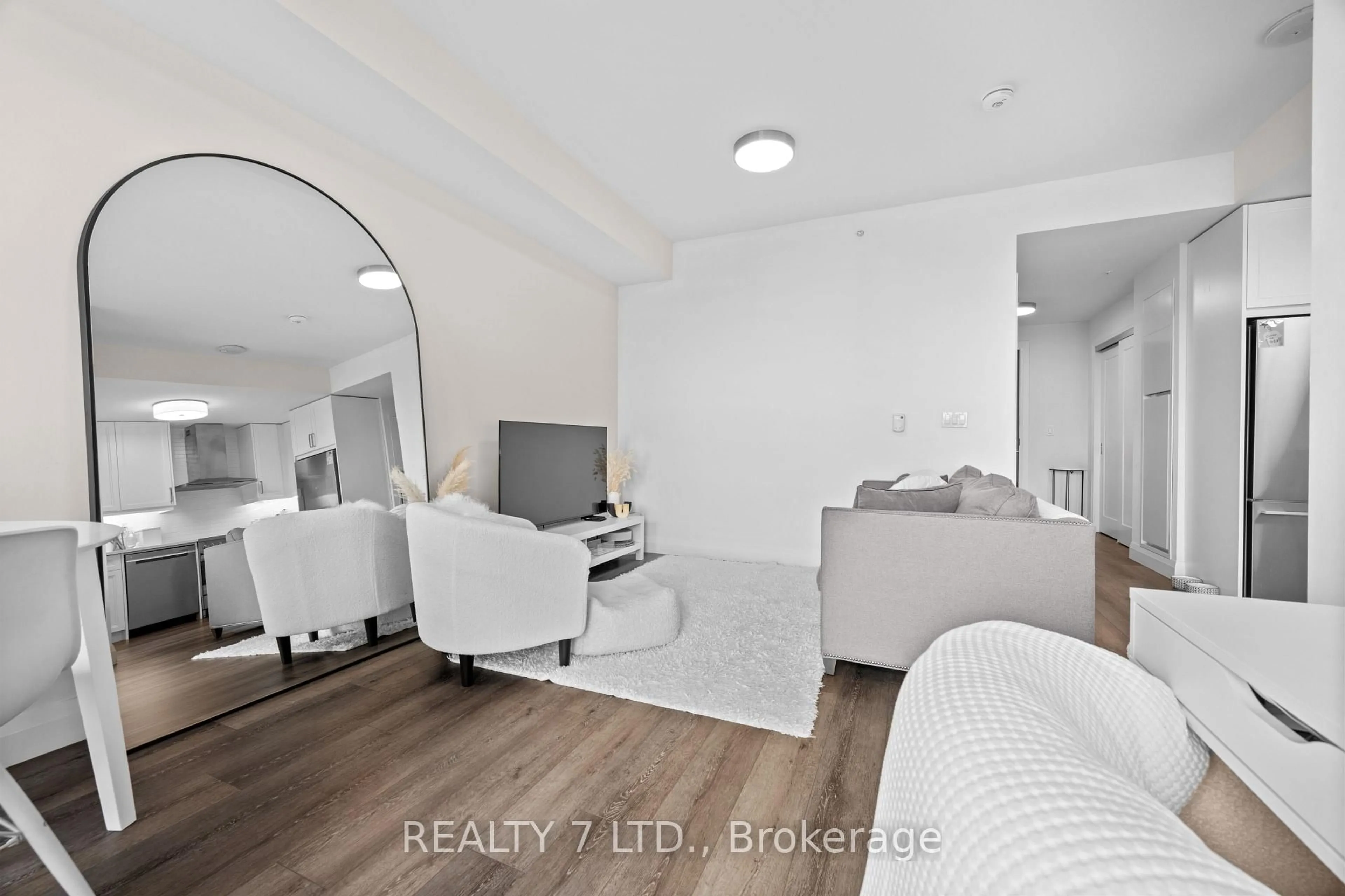 Living room with furniture, unknown for 500 Brock Ave #1701, Burlington Ontario L7S 0A5