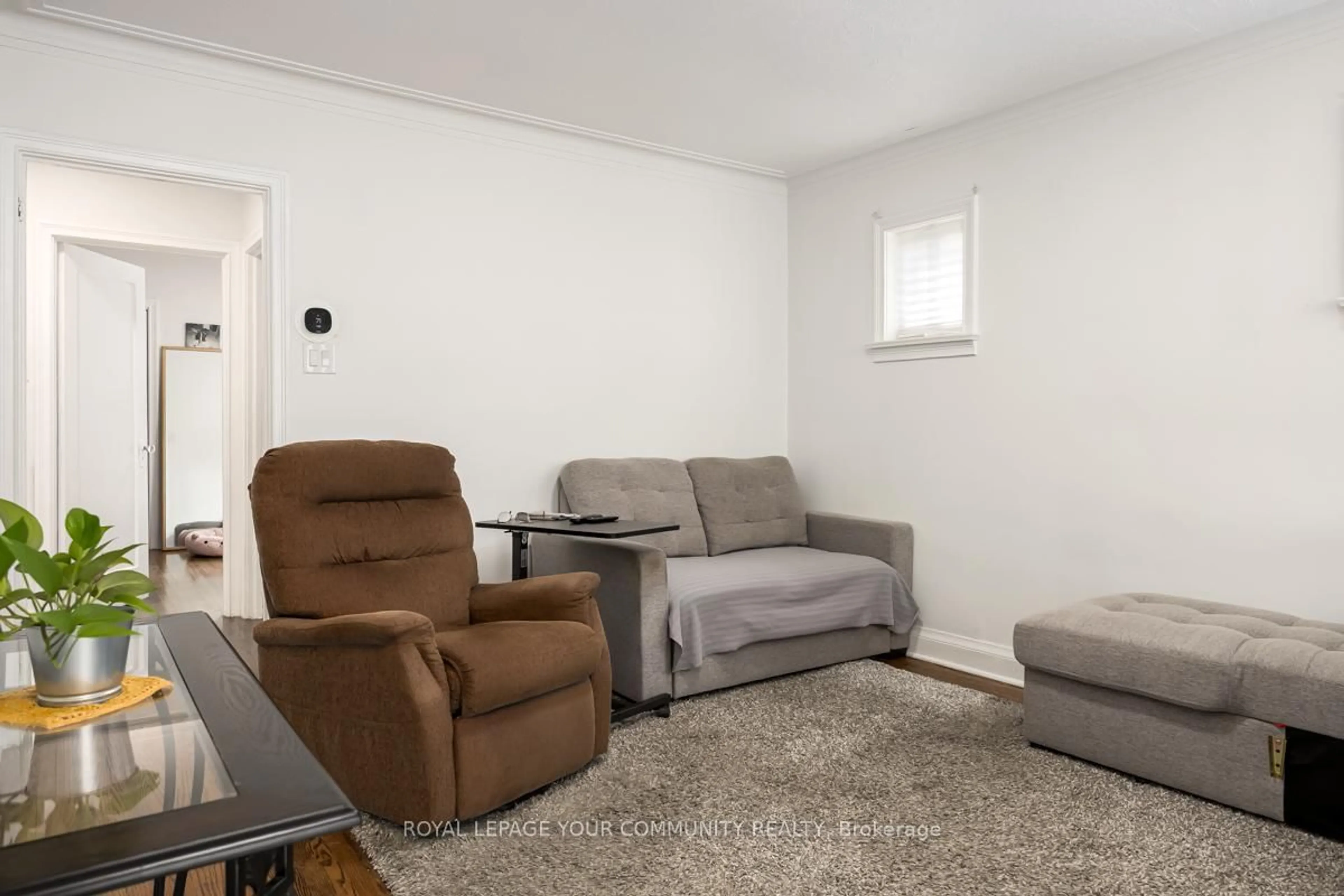 Living room with furniture, unknown for 231 Church St, Toronto Ontario M9N 1N9