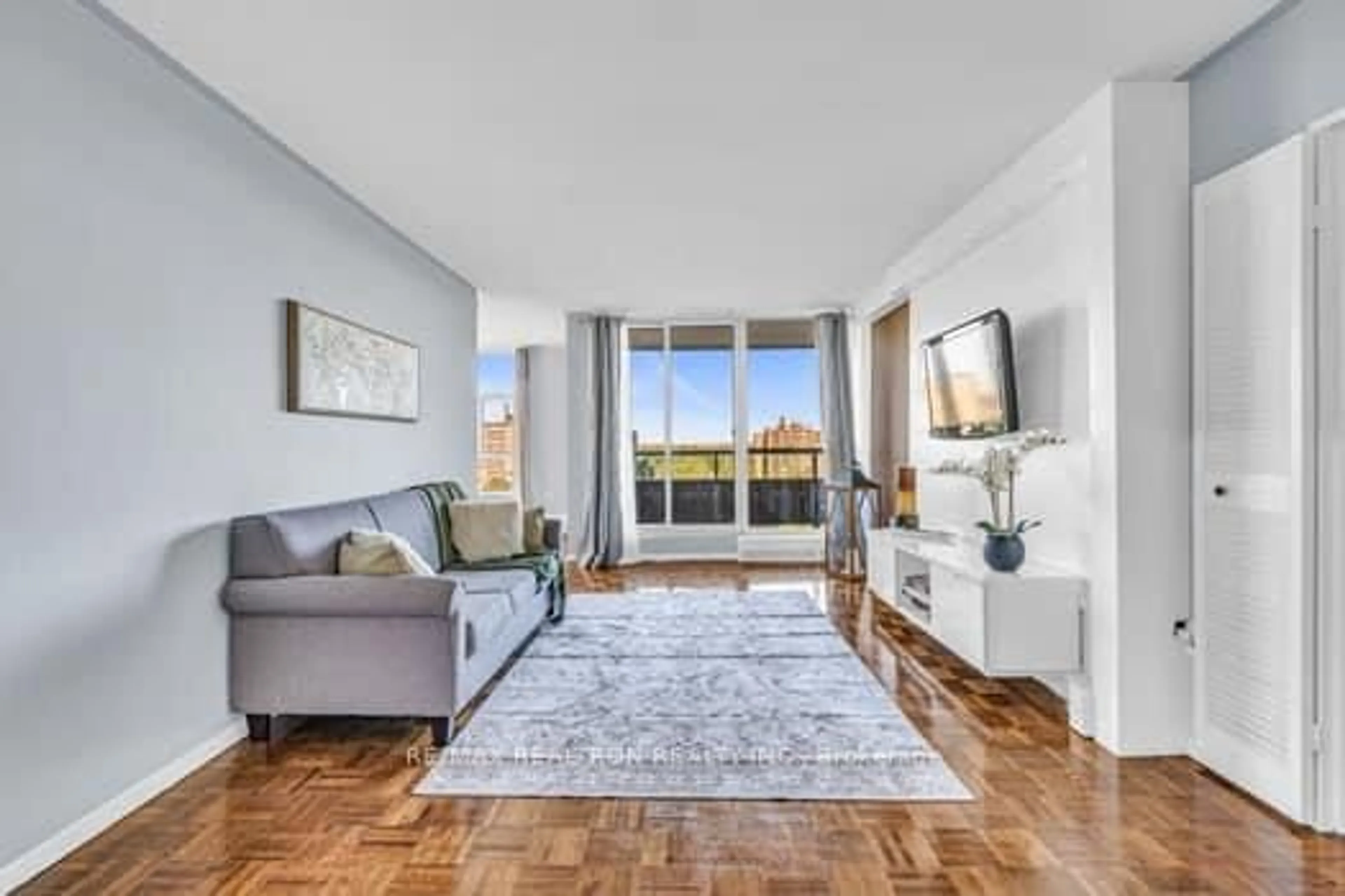 Living room with furniture, unknown for 44 Longbourne Dr #1004, Toronto Ontario M9R 2M7