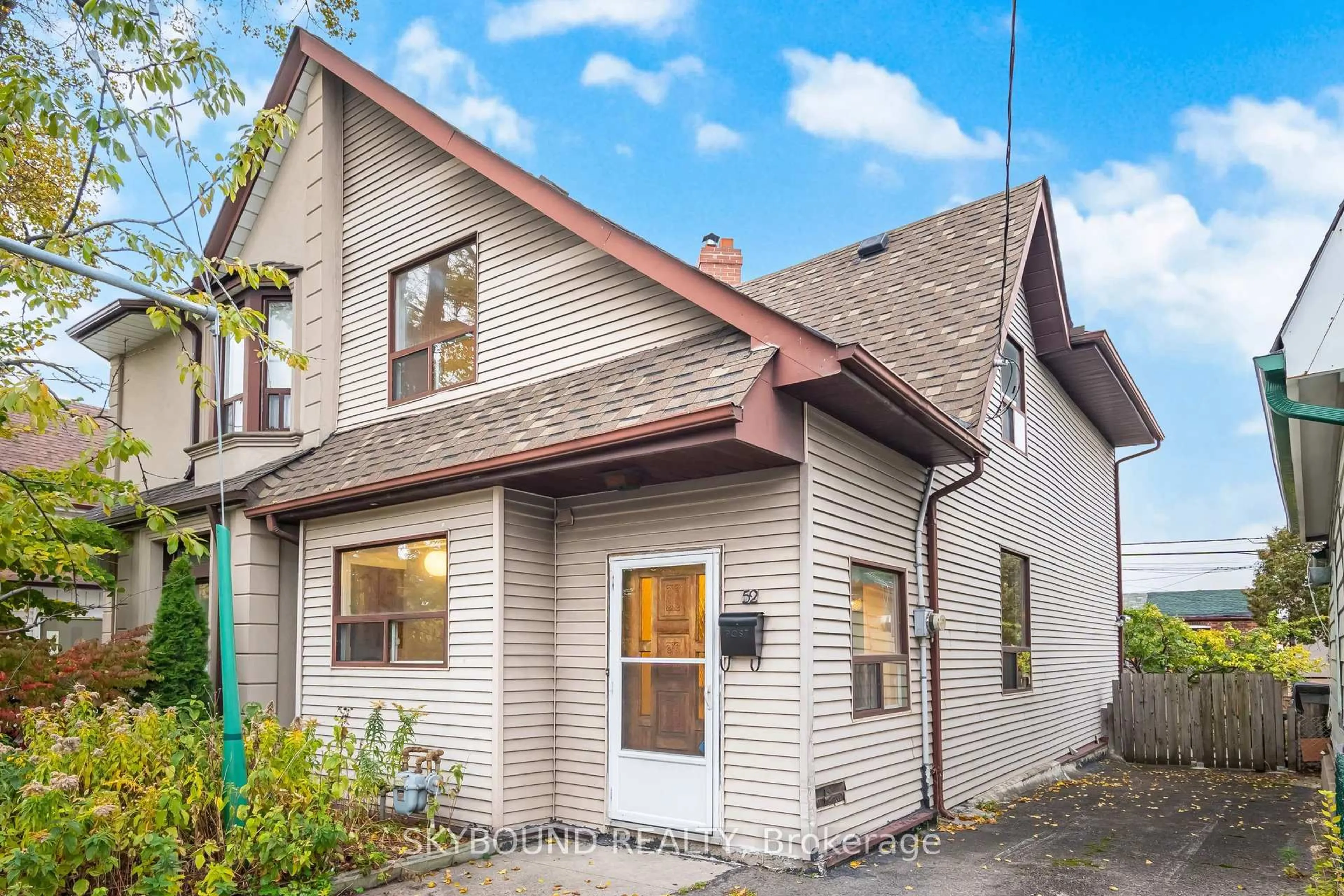 Home with brick exterior material, street for 52 Ford St, Toronto Ontario M6N 3A1